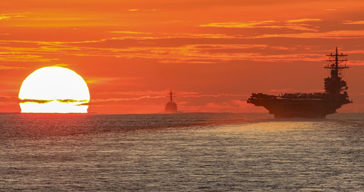 The U.S. Navy’s only forward-deployed aircraft carrier, the USS Ronald Reagan, transits the South China Sea with the missile destroyer USS Halsey and the missile cruiser USS Shiloh, on June 18, 2021.