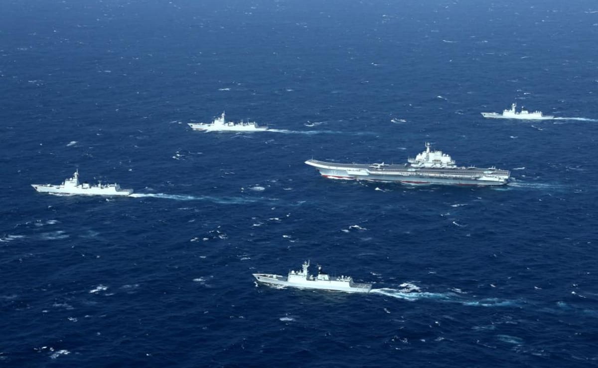 China's Liaoning aircraft carrier conducts a drill with accompanying fleet in the South China Sea in December, 2016.