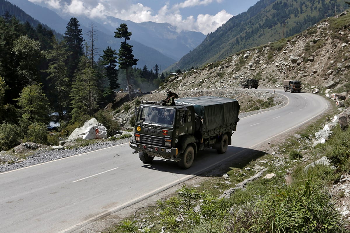 Indian army trucks move along a highway leading to Ladakh in Kashmir’s Ganderbal district, on September 3, 2020.