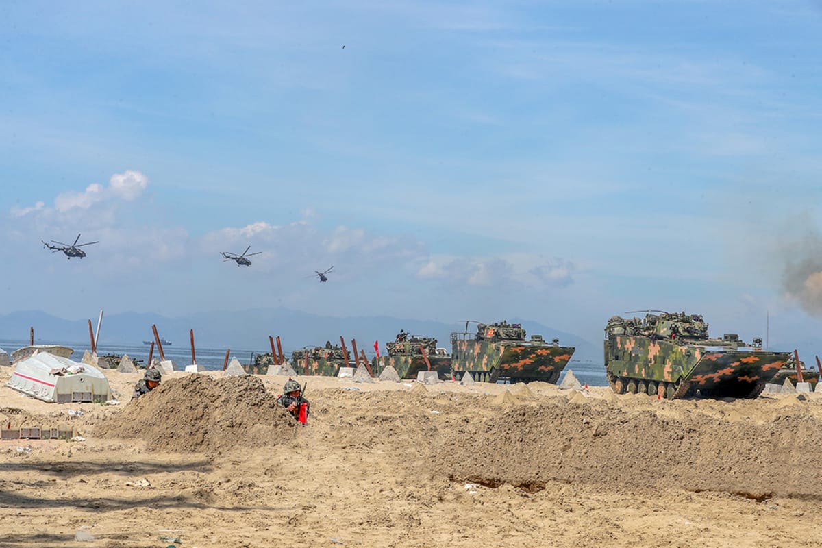 Tanks move on beach