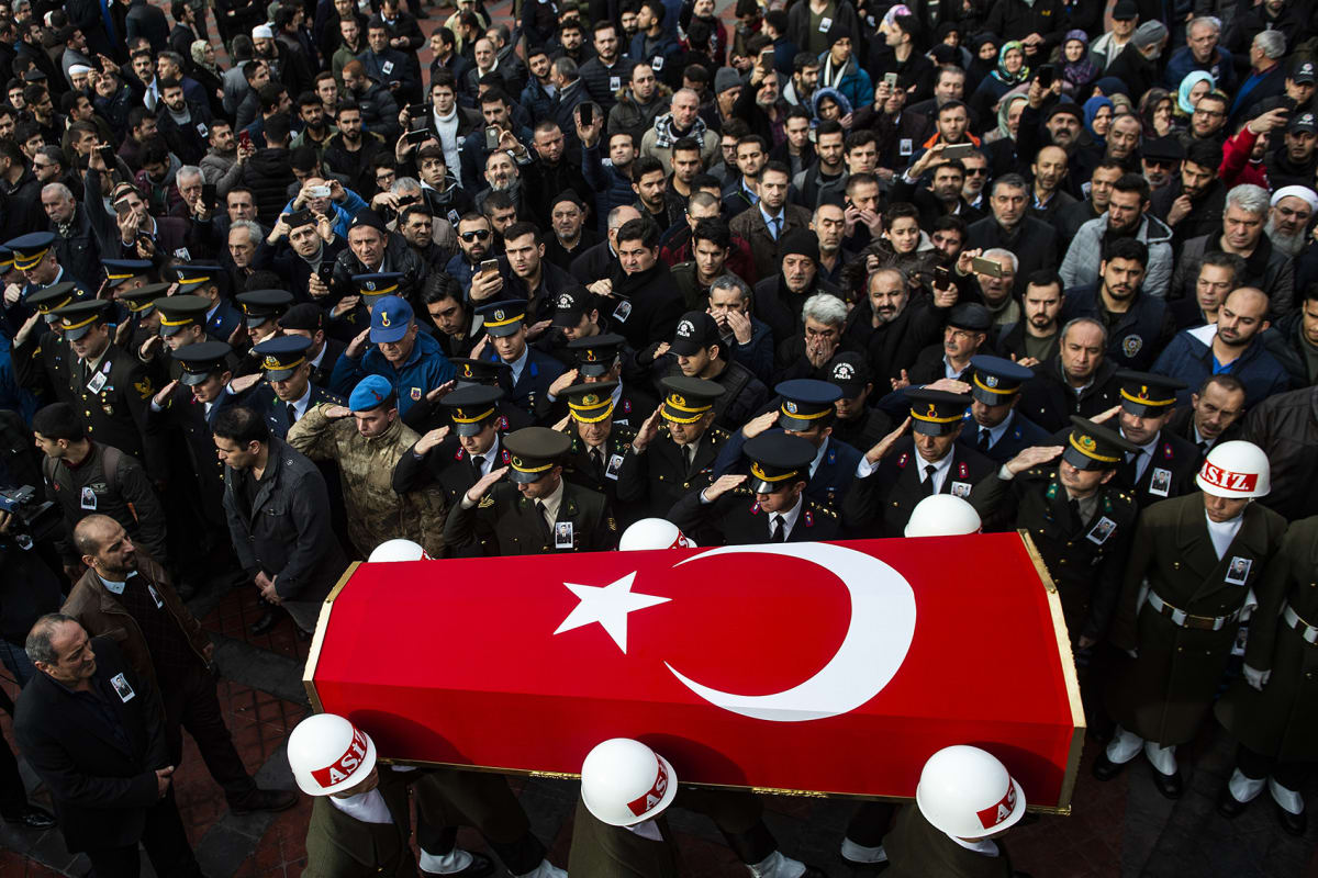 Soldiers carry the flag-wraped coffin of Muhammad Ali Kalo, a Turkish soldier who was killed during an operation against Syria’s Afrin region, during the funeral ceremony in Istanbul on December 15, 2018. 