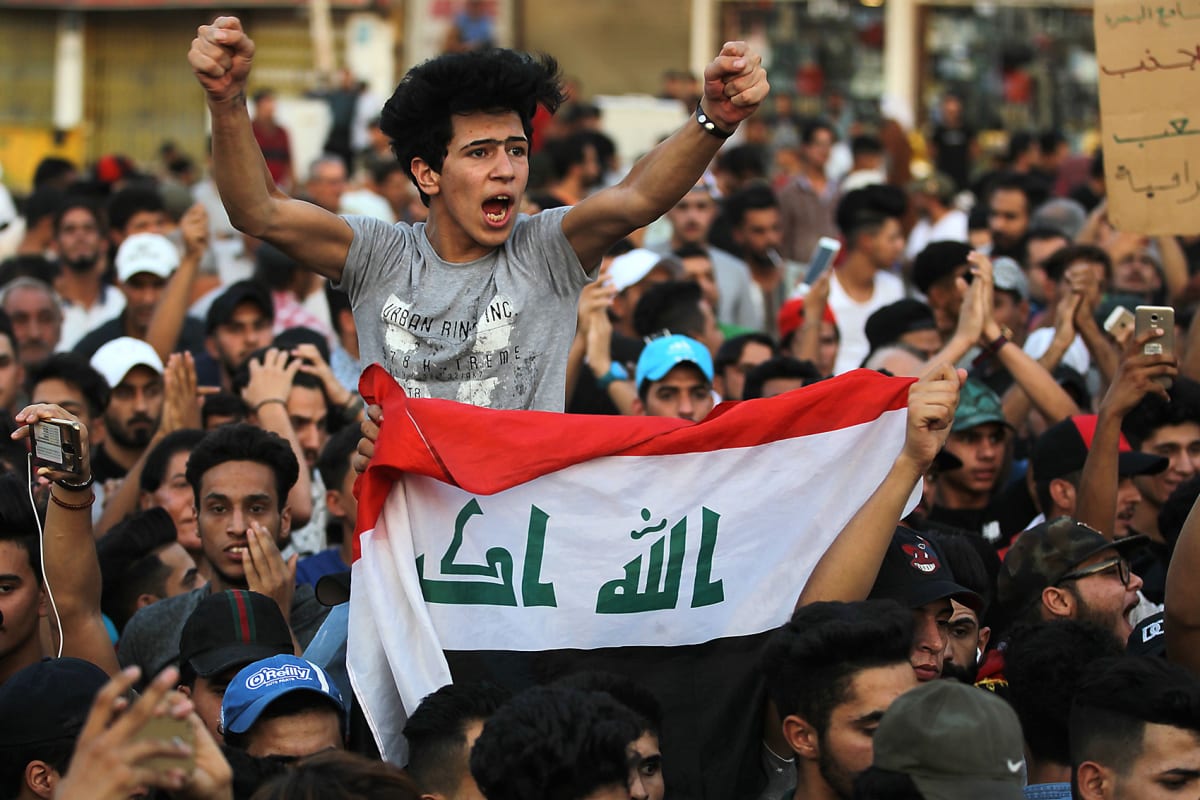 Iraqis demonstrate in Tahrir Square in central Baghdad against corruption and lack of services on September 7, 2018. 