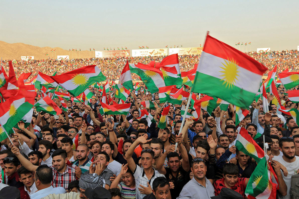 Kurdish people attend a rally to show their support for the upcoming September 25 independence referendum in Duhuk, Iraq on September 16, 2017. 