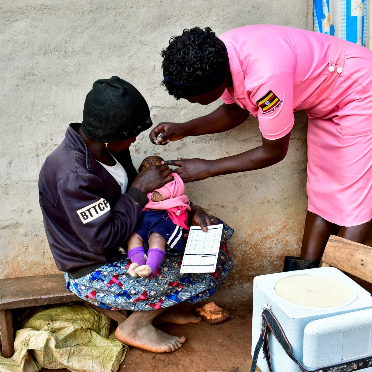 A nurse administers polio vaccine to a child during her community outreach program, in Mushelusi village, in Bulambuli district, Uganda, on September 10, 2025.