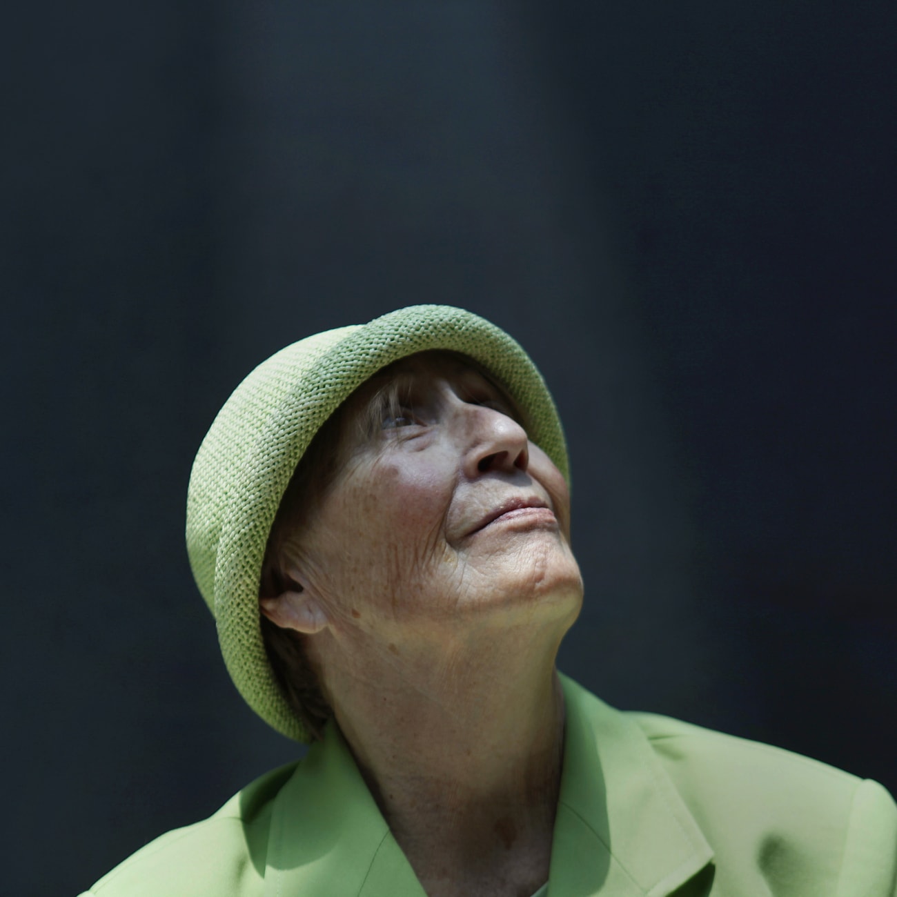 Teresa, 75, an Alzheimer's patient and former businesswoman, poses for a photograph inside the Alzheimer Foundation, in Mexico City, Mexico, on April 19, 2012.