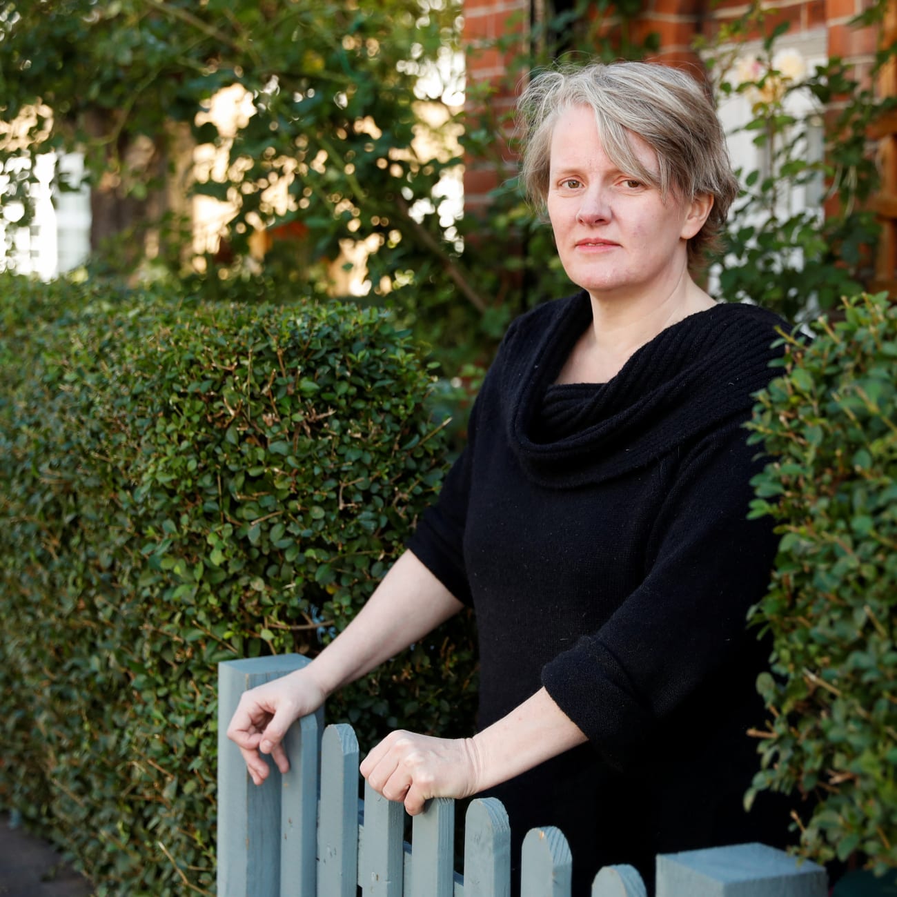Felicity Callard, a 49-year-old British university professor and lecturer who continues to struggle with symptoms following a COVID-19 infection, poses after an interview at her house, in London, Britain, on September 2, 2020.