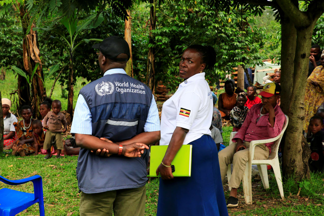 World Health Organization officials and Ugandan health workers inform the community of Kirembo village about the ebola vaccine, in Kasese district, Uganda, on June 15, 2019.