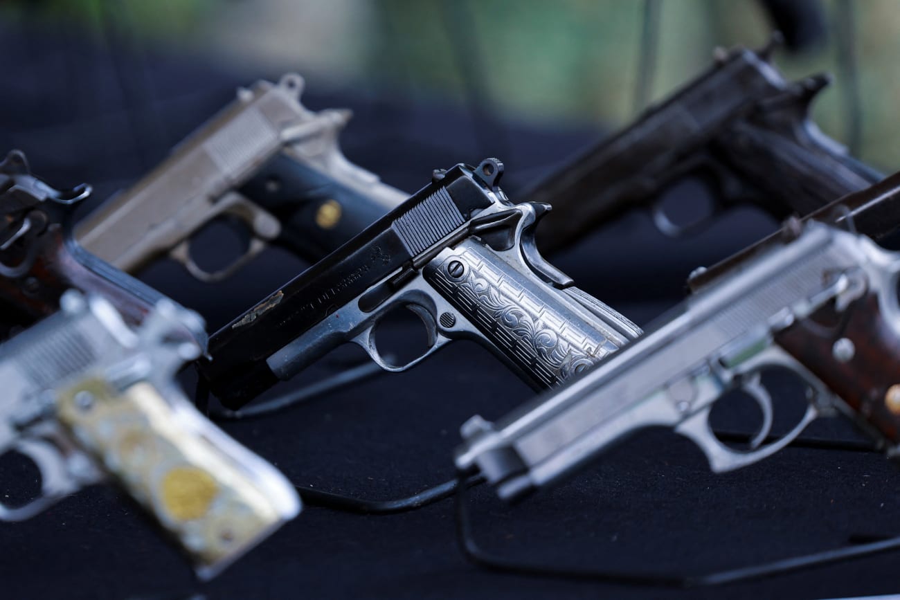 Guns that will be destroyed are displayed during an event for the International Day for the Destruction of Firearms, at the Basilica of Our Lady of Guadalupe, in Mexico City, Mexico, on July 9, 2025.