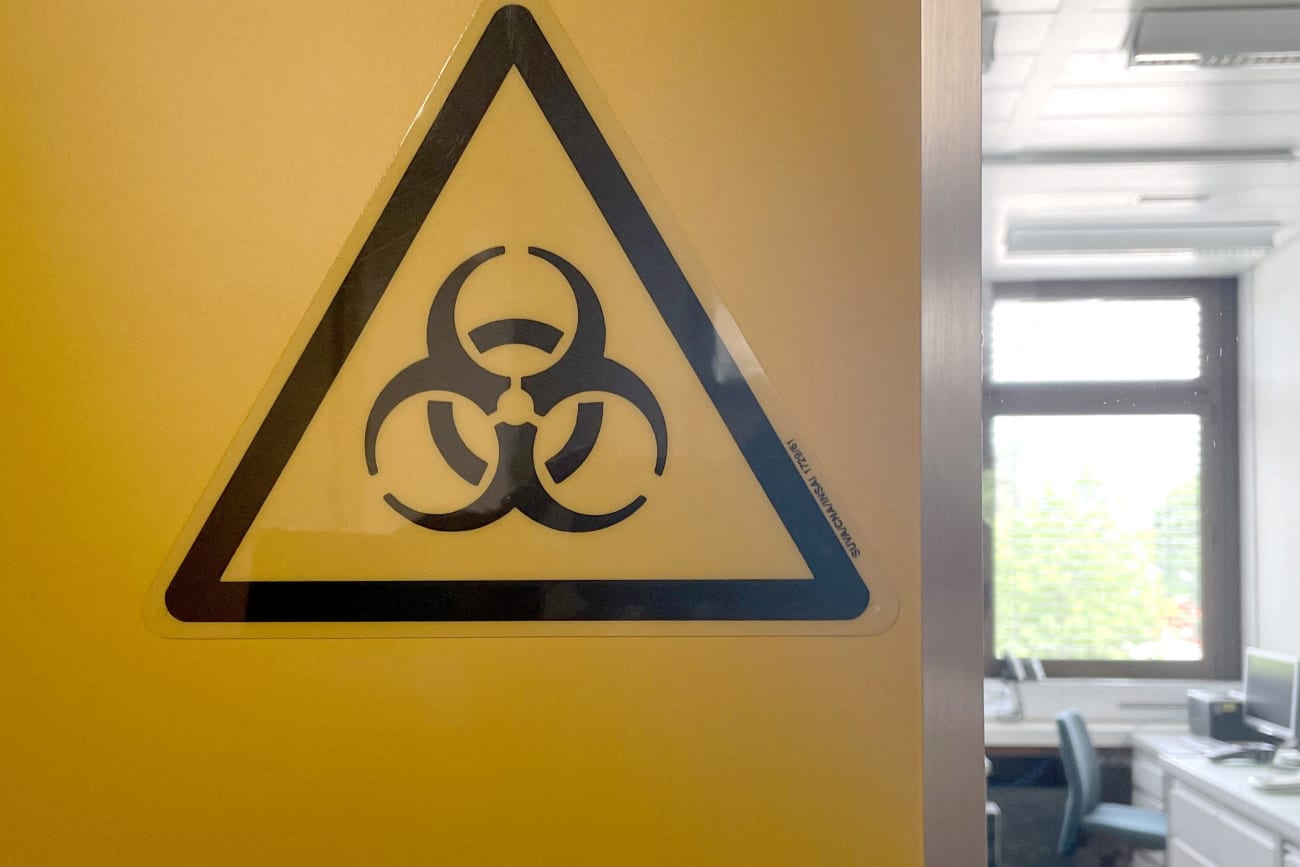 A biohazard sign is displayed in the biocontainment facility of the Spiez Laboratory, in Spiez, Switzerland, on June 8, 2022.