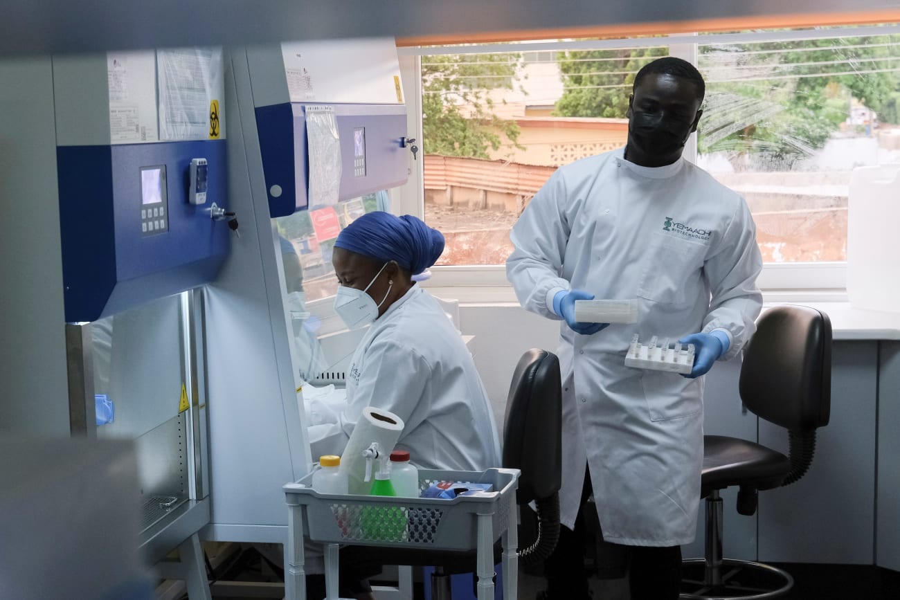 Research associates prepare samples at Yemaachi Biotechnology, a cancer research laboratory, in Accra, Ghana, on May 19, 2022.