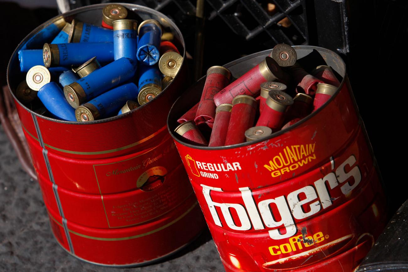 Old coffee cans of shotgun shells dropped off to the Los Angeles County Sheriff's Department at the 