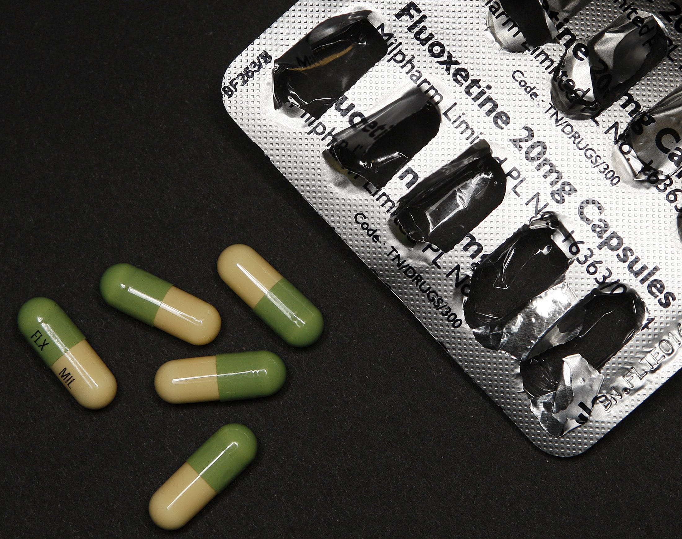 The antidepressant drug Prozac, also known as fluoxetine, are seen on a table, in Leicester, England, on February 26, 2008.