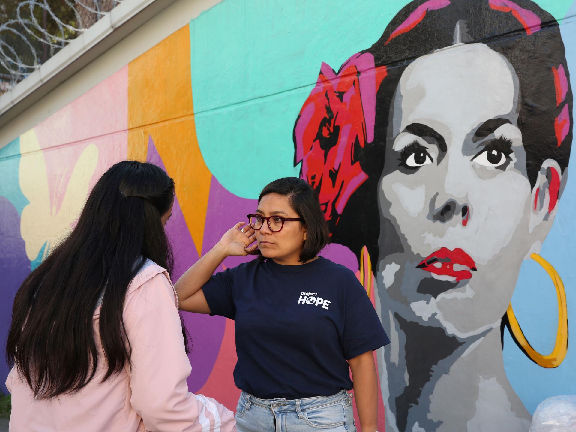 Project HOPE Mexico country director Corina Martínez (right) and health promoter Yoseline Perez (left), along with nursing students from CONALEP Tlalnepantla, provide a mobile health screening clinic to residents in the town of Tlalnepantla de Baz. Mexico.