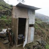 A toilet stands outside the Llamocca family home at Villa Lourdes in Villa Maria del Triunfo on the outskirts of Lima, Peru, October 7, 2015. There is no running water in Villa Lourdes and families buy it from water tankers once a week.