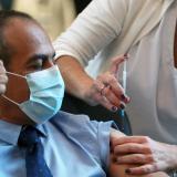 Dr. Ronni Gamzu, head of Ichilov hospital and former Israeli coronavirus chief is vaccinated against the coronavirus disease (COVID-19) as Israel kicks off a coronavirus vaccination drive, at Tel Aviv Sourasky Medical Center (Ichilov Hospital) in Tel Aviv, Israel on December 20, 2020.