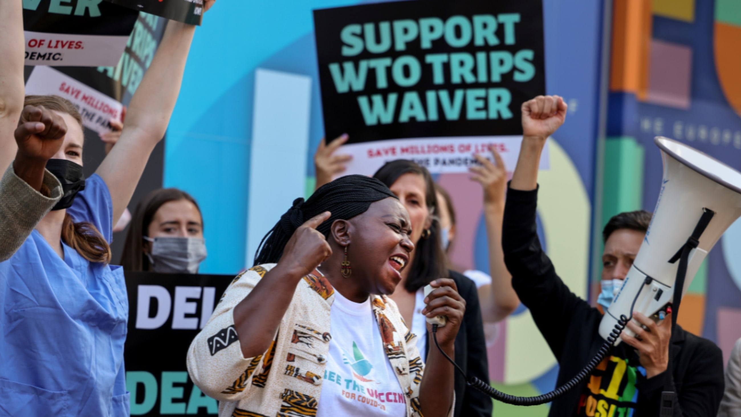 Pauline Muchina, of American Friends Service Committee, and activists call on the EU to end opposition to a COVID-19 waiver of WTO intellectual property barriers, in Washington, DC, June 24, 2021.