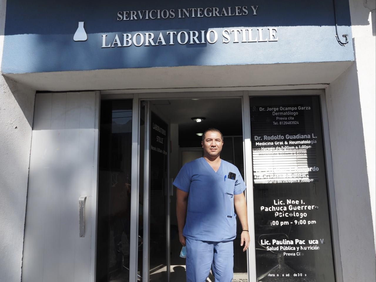 Guadiana stands in front of the clinic where he works in Hidalgo, Mexico, January, 2023.