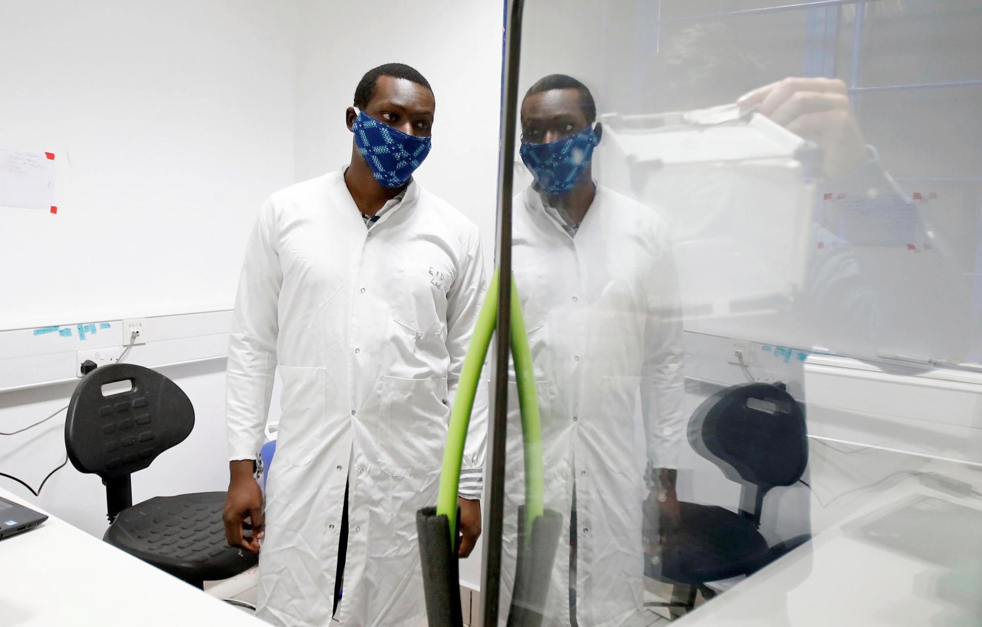 Researchers work on a microbe they say can protect mosquitoes from malaria, at the International Centre of Insect Physiology and Ecology headquarters, in Nairobi, Kenya on, May 11, 2020. REUTERS/Jackson Njehia