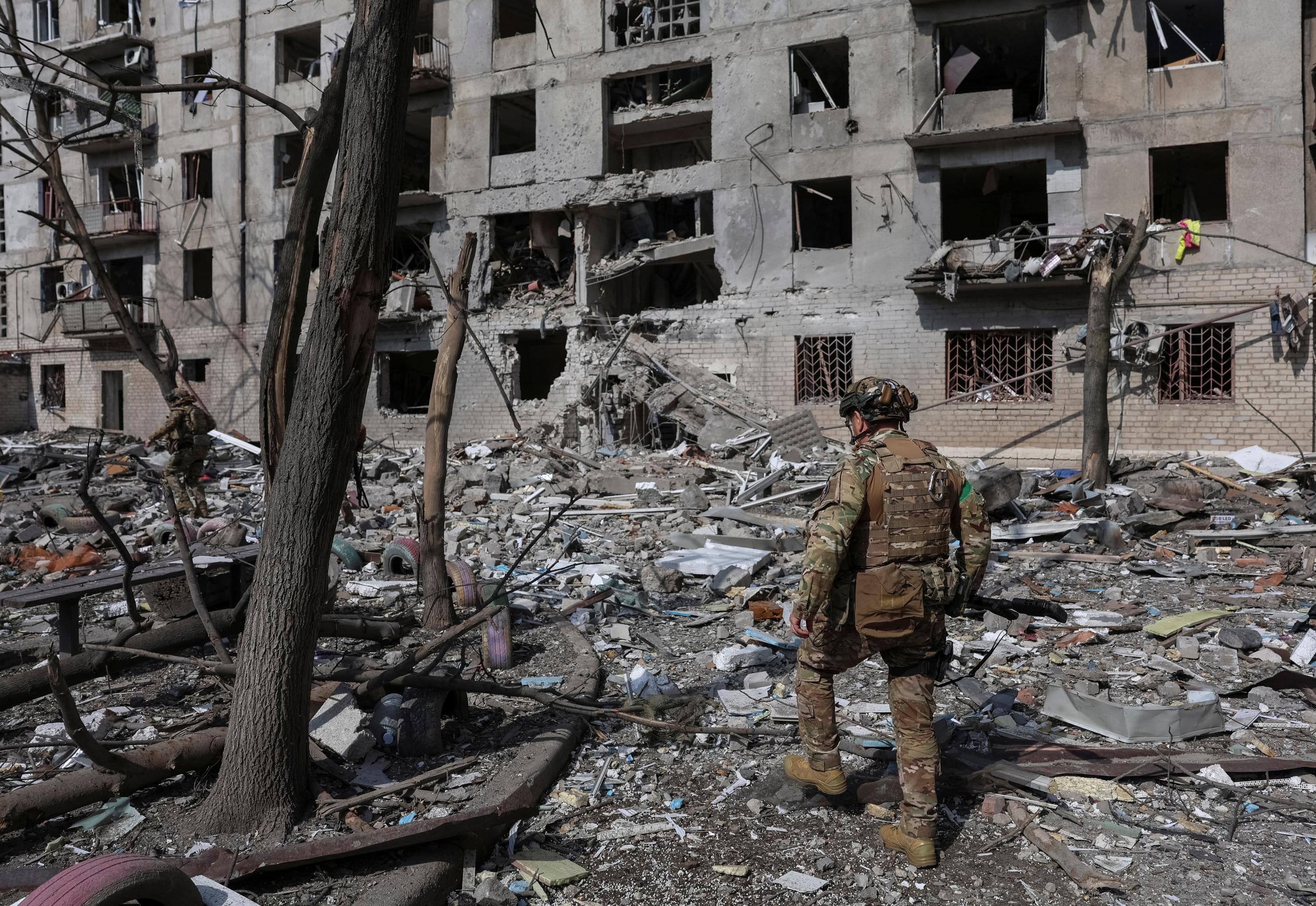Members of the White Angel unit of Ukrainian police officers check an area for residents, amid Russia's attack on Ukraine, in Pokrovsk, on Ukraine April 12, 2025.