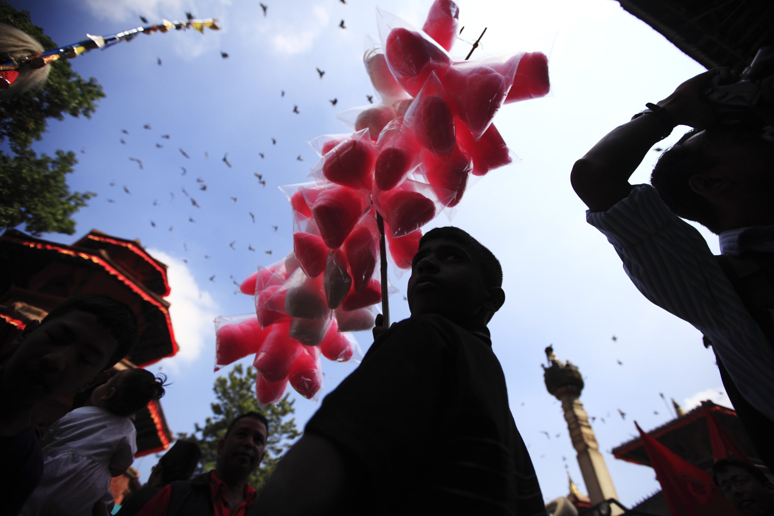 A boy sells cotton candy during the Indra Jatra festival, in Kathmandu, Nepal, on September 27, 2012.