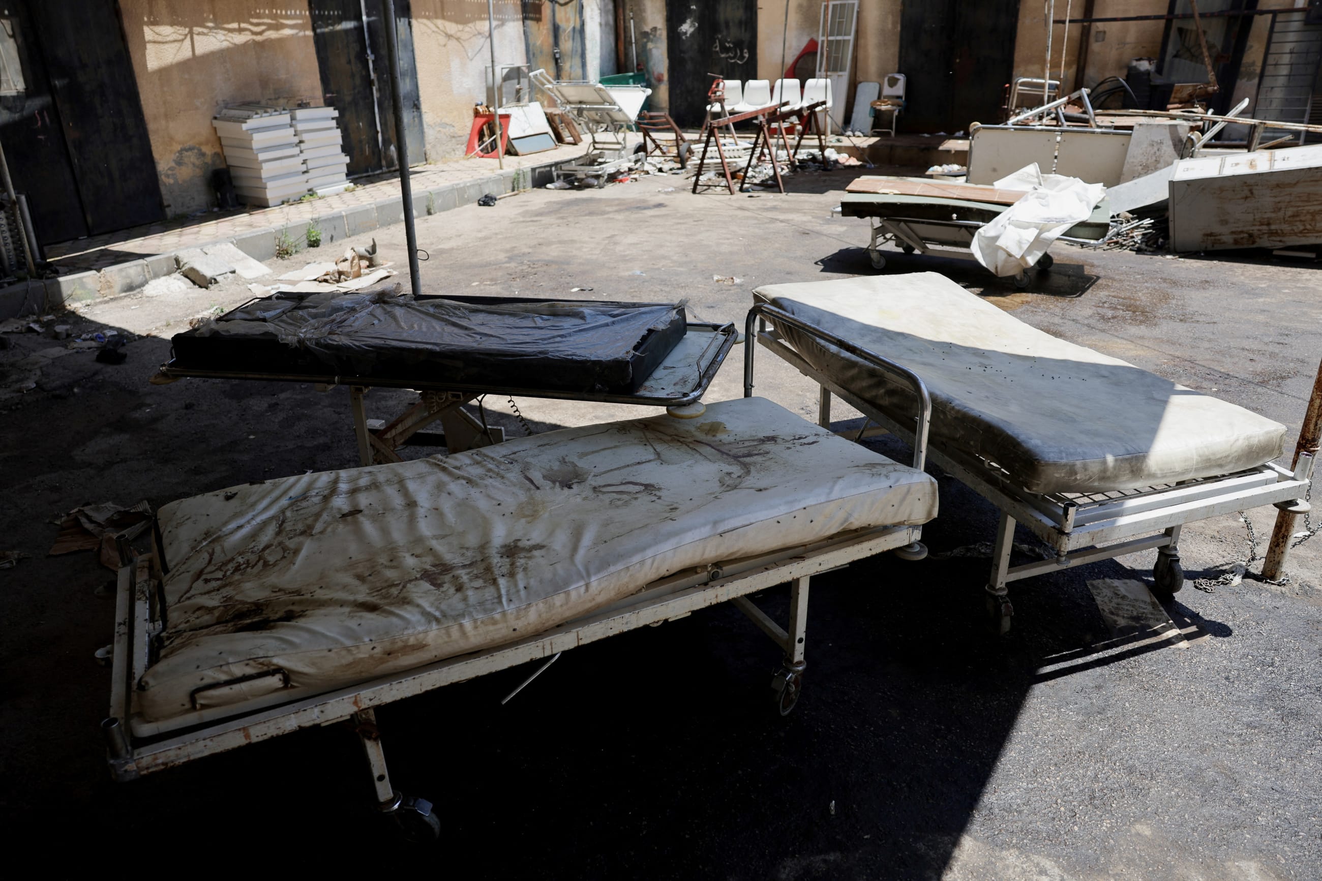 Stretchers stand outside a hospital, following deadly clashes between Druze fighters, Sunni Bedouin tribes and government forces, Sweida, Syria, on July 25, 2025.