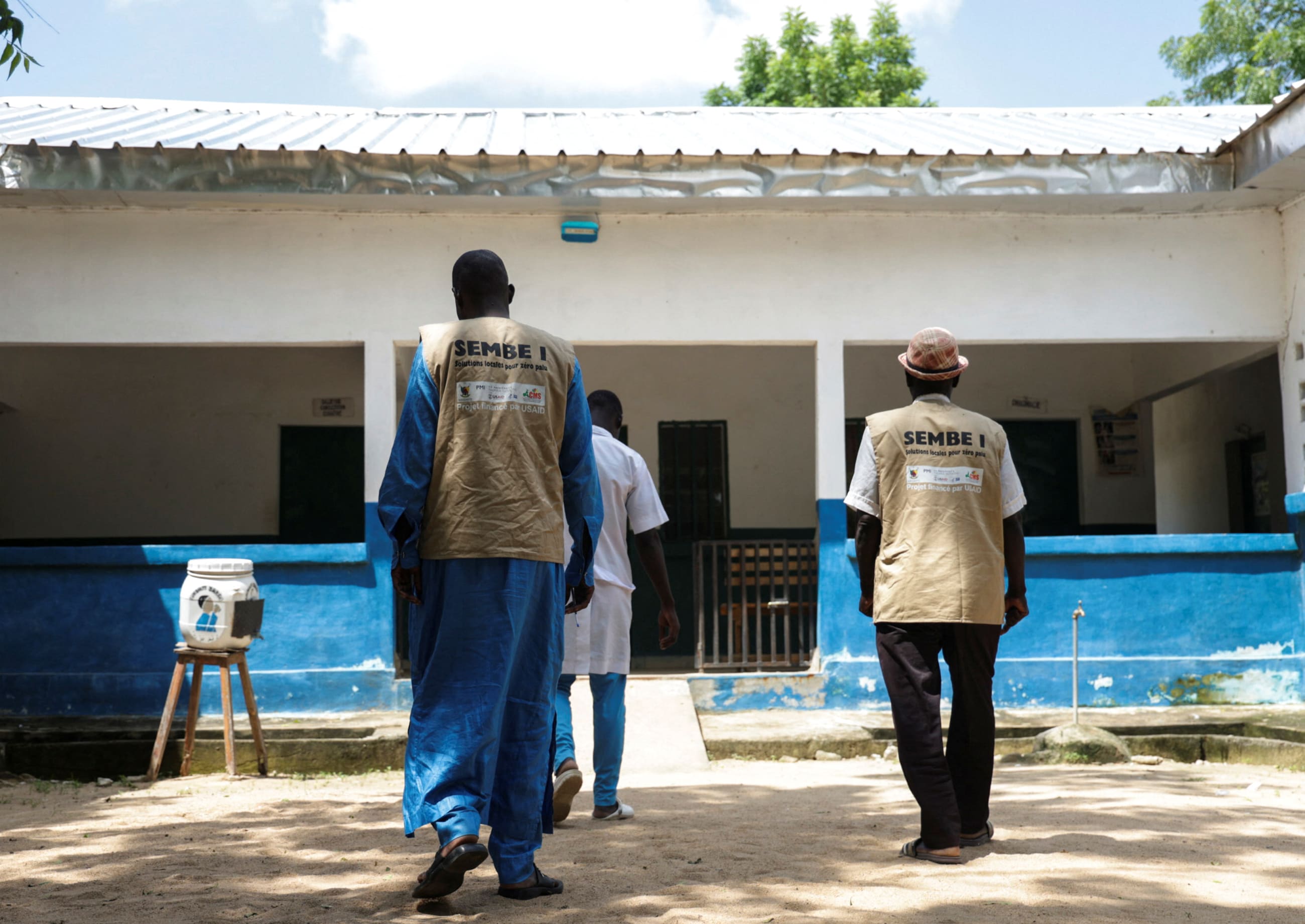 Community health workers walk at an Integrated Health Center, in Bogo, Cameroon, on September 2, 2025.