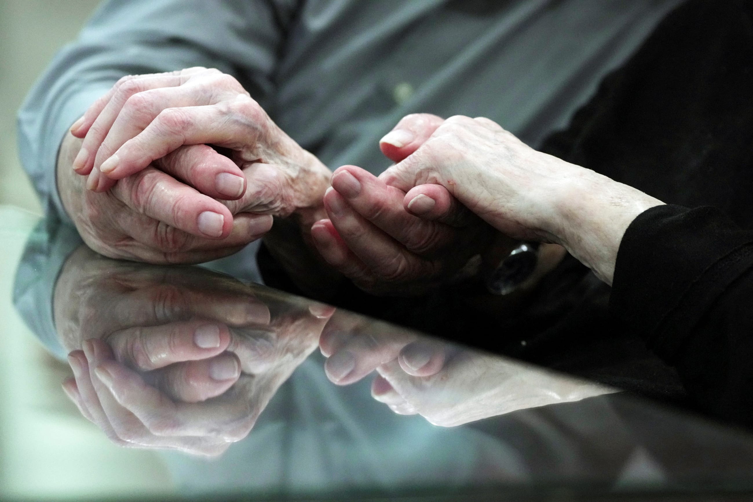 Bobby Pugh, 91, cares for his wife Bessie Pugh, 90, who is an Alzheimer's patient at the Ave Maria Home, an assisted living center for seniors, in Bartlett, Tennessee, on September 13, 2023.