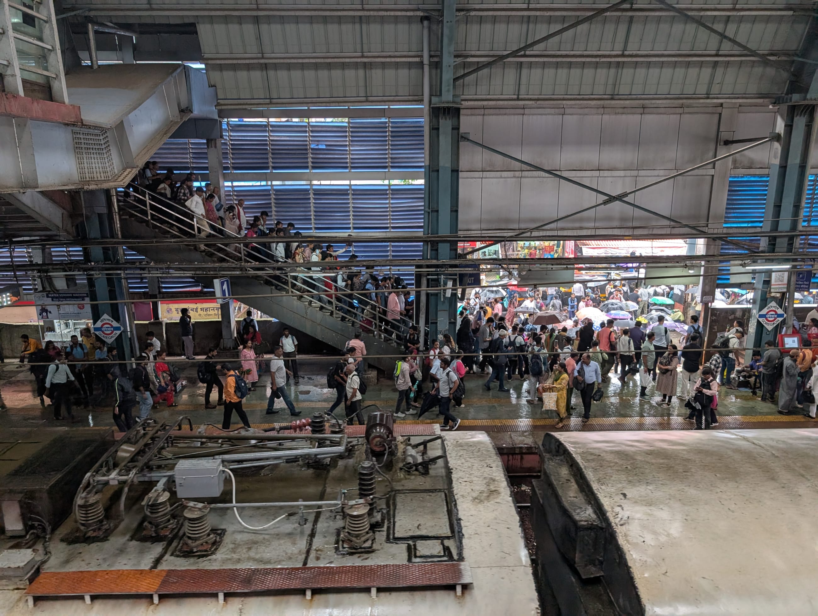 Train commuters at Goregaon railway station in suburban Mumbai, India, on August 7, 2025.