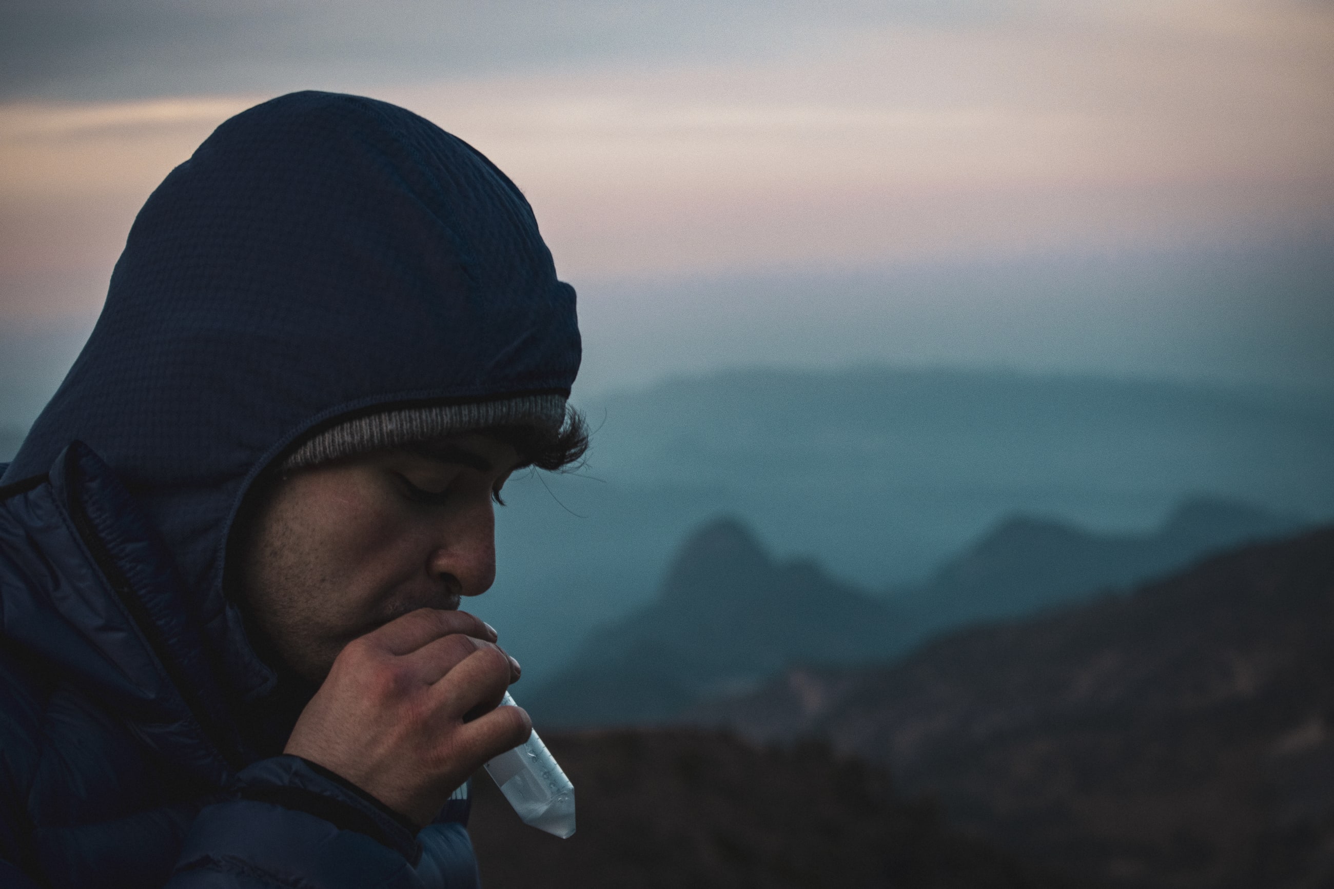 Jacob Bartz, research expedition lead, collects a saliva sample, at Pico de Orizaba base camp, December 2024.