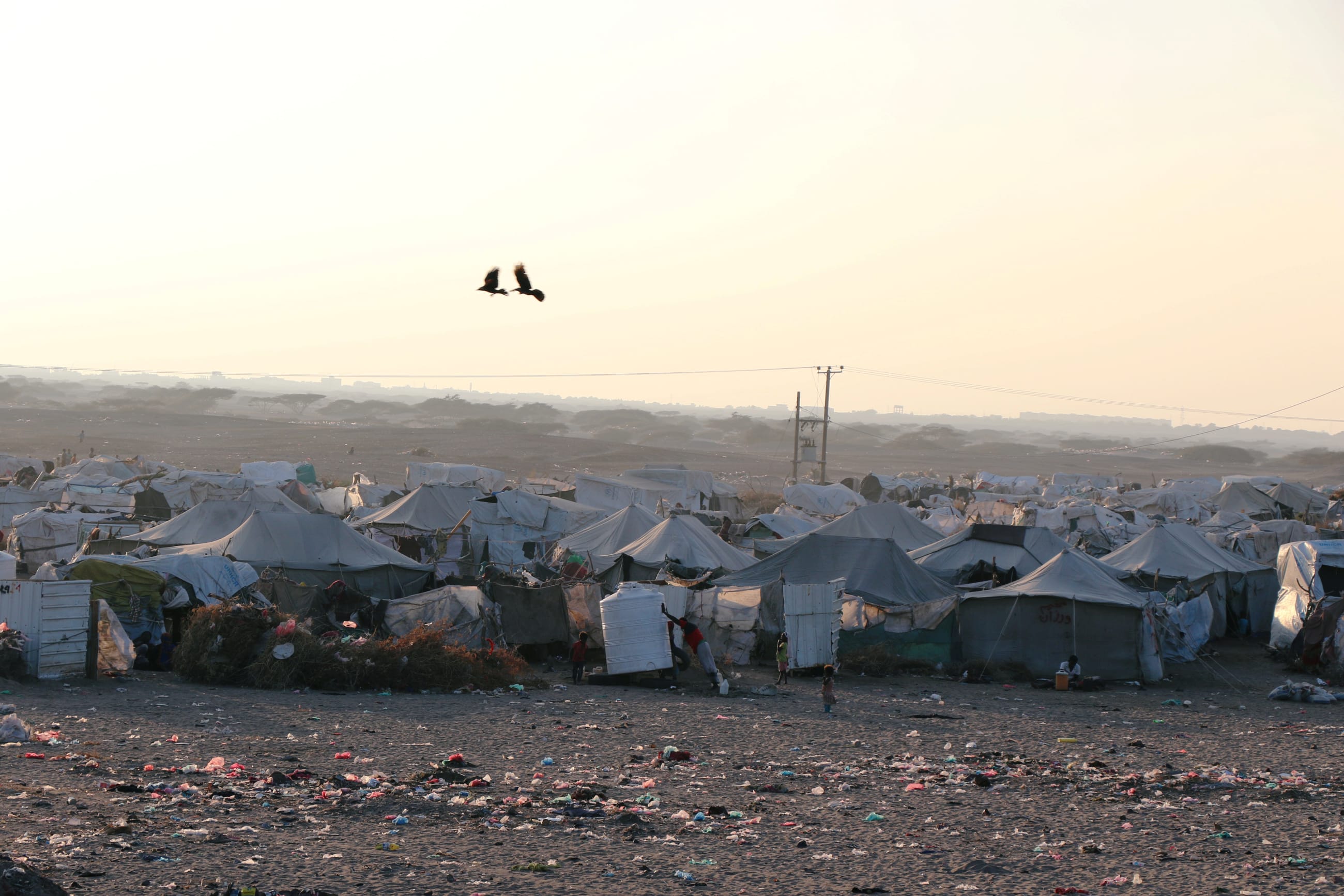 Tents sheltering displaced people are seen from the Red Sea port city of Hodeidah, near Aden, Yemen, on November 12, 2018.