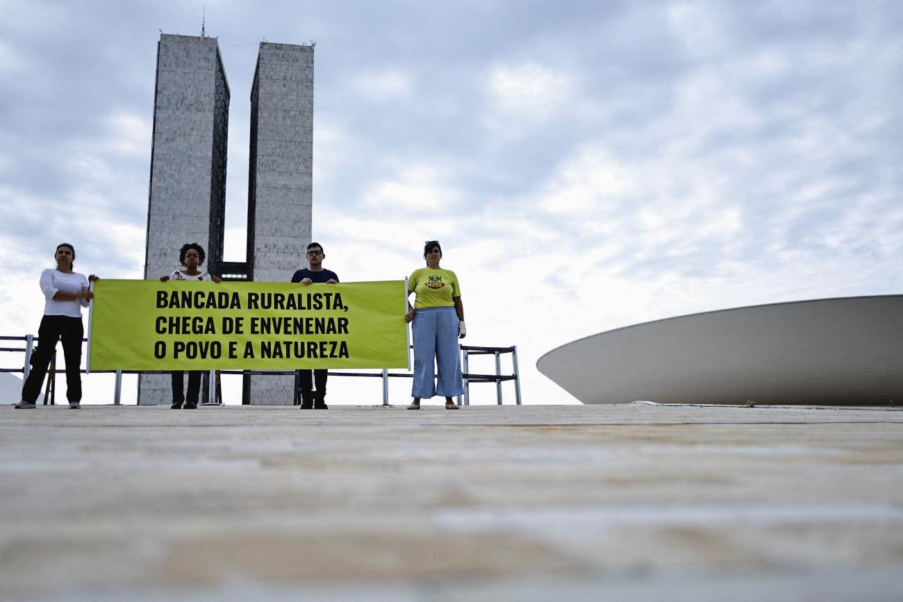DOCUMENT DATE: October 04, 2023 Greenpeace activists hold a sign reading in Portuguese : "Ruralist Bench, no more poisoning the people and nature."