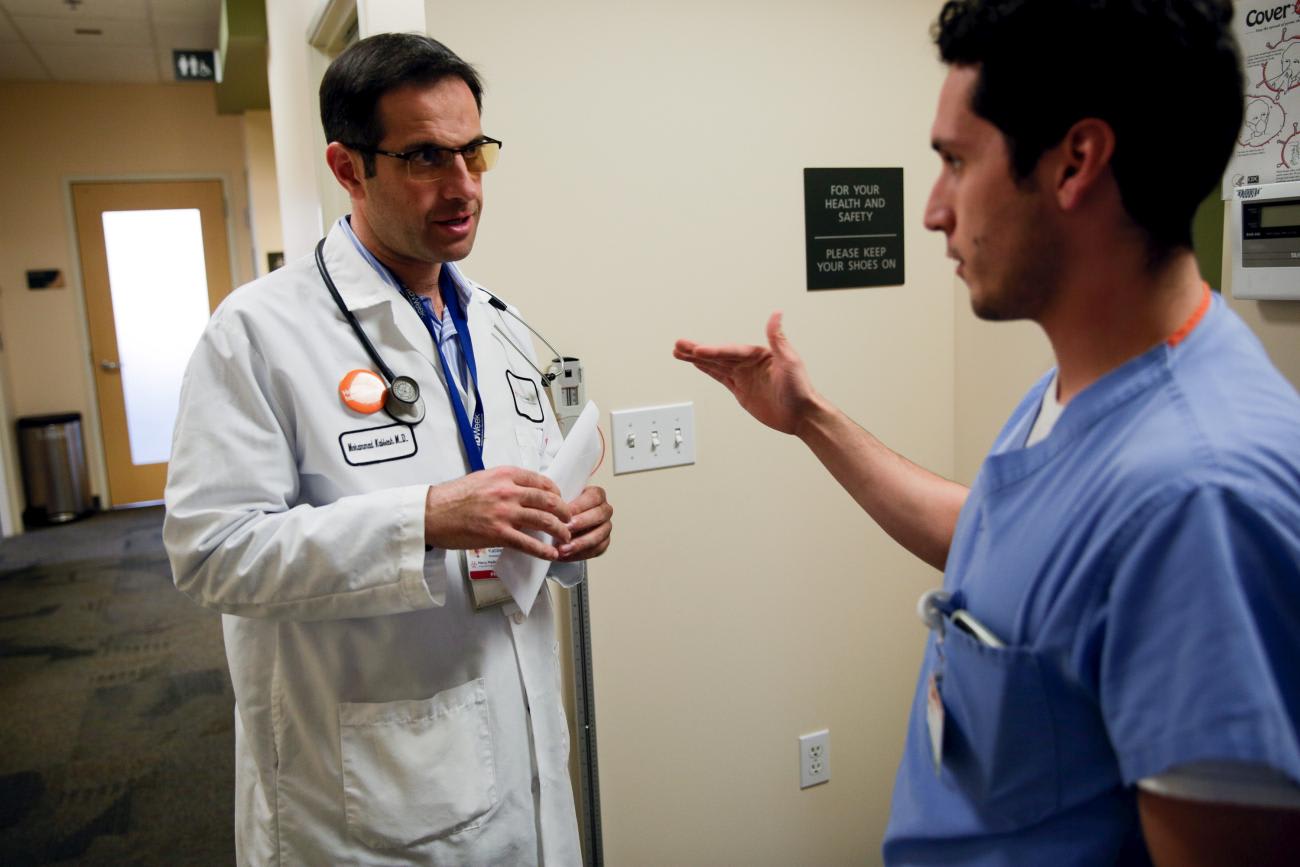 Mohammad Jaber, MD, who immigrated from Syria to the United States to pursue a medical degree, prepares to visit a patient in Sacramento, California, on November 17, 2015.