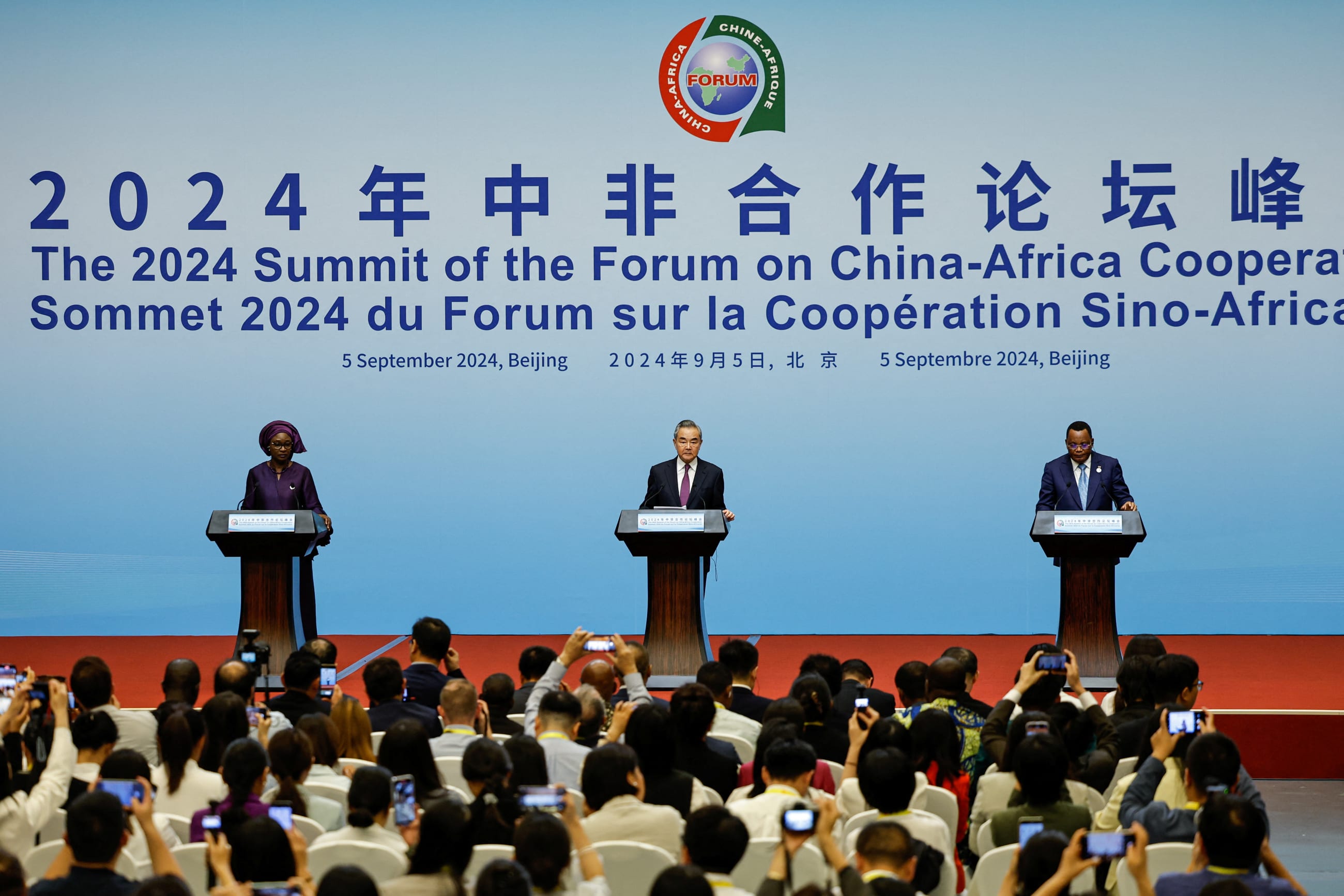 Senegal's Foreign Minister Yassine Fall, China's Foreign Minister Wang Yi and Republic of the Congo's Foreign Minister Jean-Claude Gakosso attend a press conference during the 2024 Summit of the Forum on China-Africa Cooperation (FOCAC), in Beijing, China, on September 5, 2024.