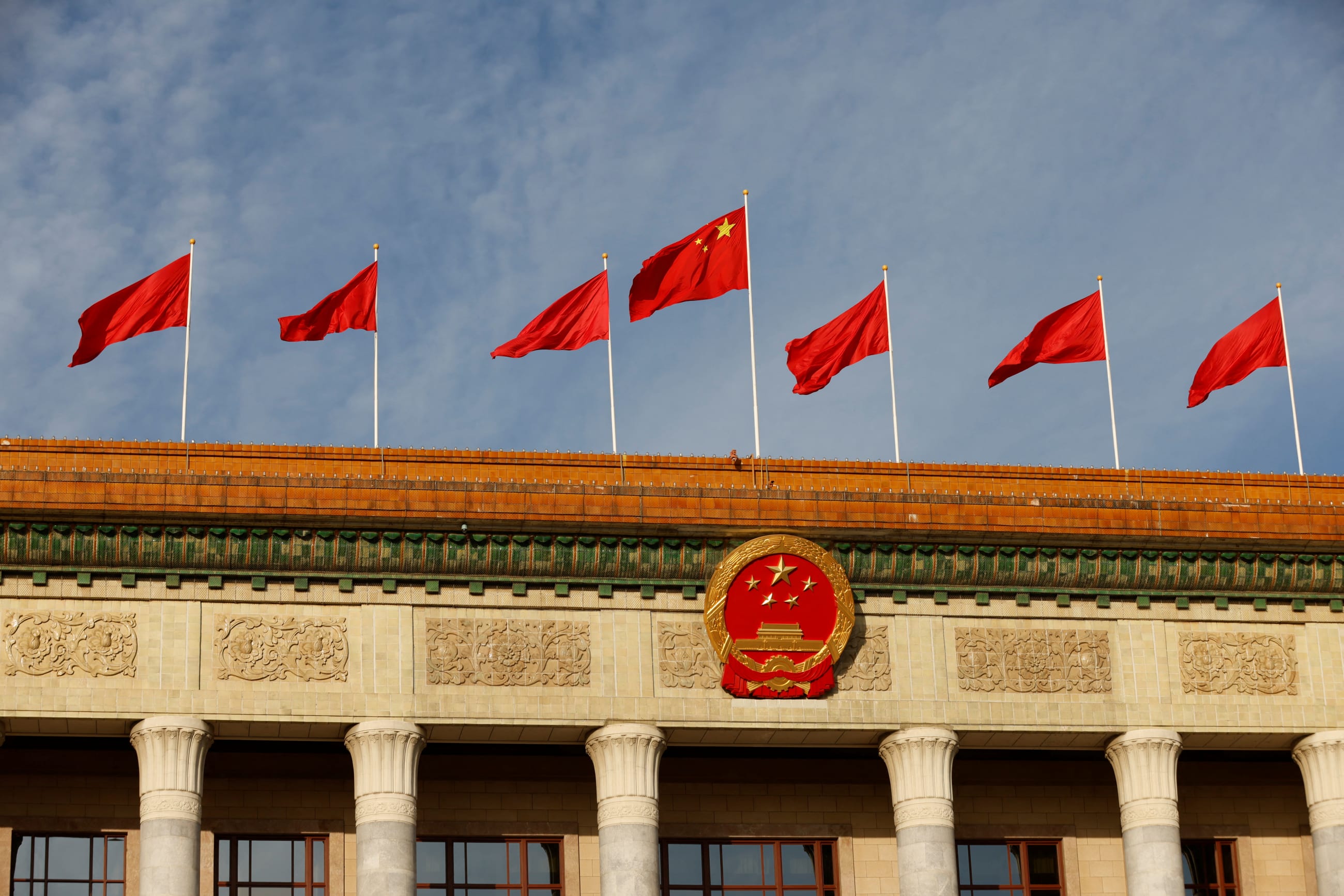 A Chinese flag flutters on top of the Great Hall of the People ahead of the opening ceremony of the Belt and Road Forum (BRF), to mark the 10th anniversary of the Belt and Road Initiative, in Beijing, China, on October 18, 2023.