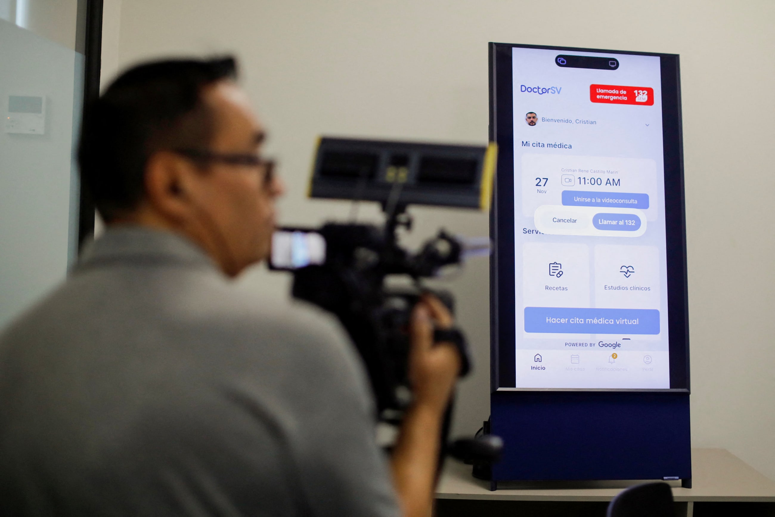 A test of DoctorSV, an app that provides virtual medical care with AI support, is displayed on a monitor during a media tour, in San Salvador, El Salvador, on November 27, 2025.