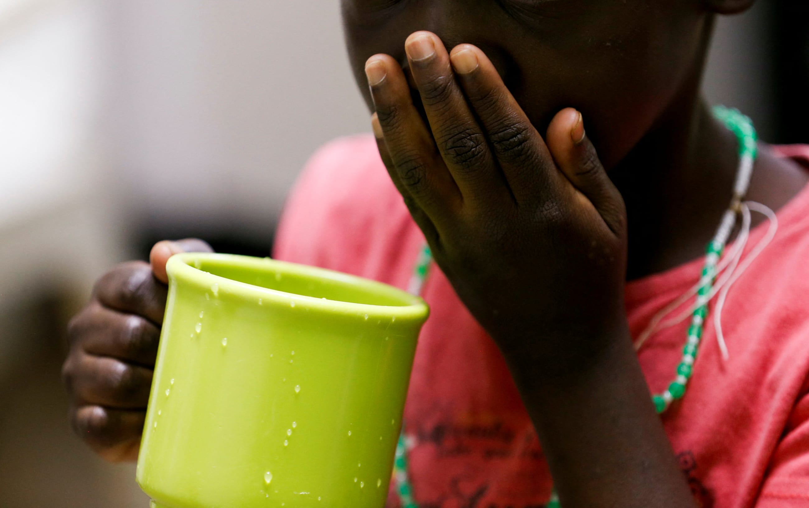 A child takes a dose of antiretroviral ARV drugs used to prevent HIV from replicating, at the Nyumbani Children's Home, in Nairobi, Kenya, on February 12, 2025.