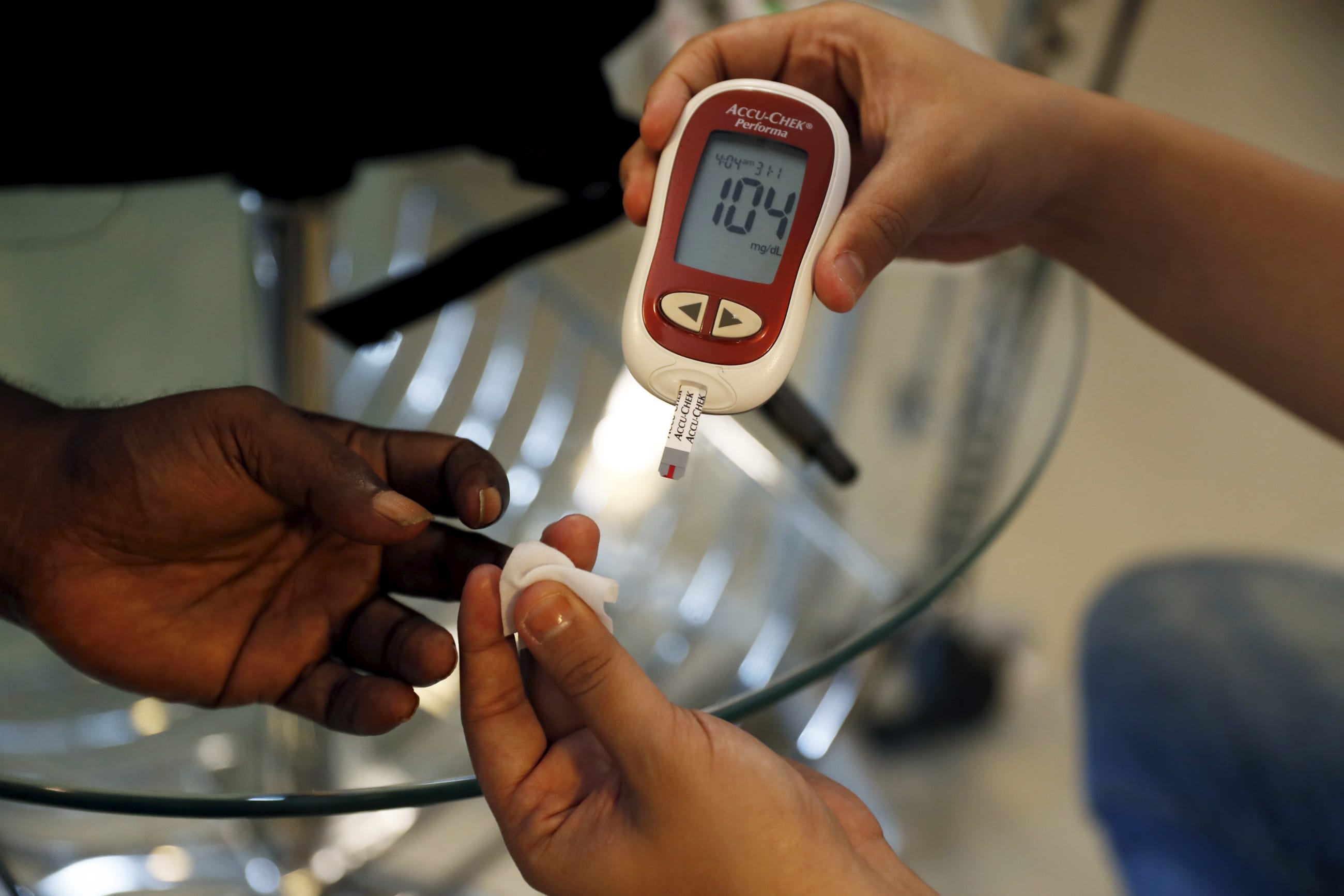 A paramedic checks the blood sugar level of a patient at SS Diabetes Care clinic, in Jakarta, Indonesia, on April 22, 2016.