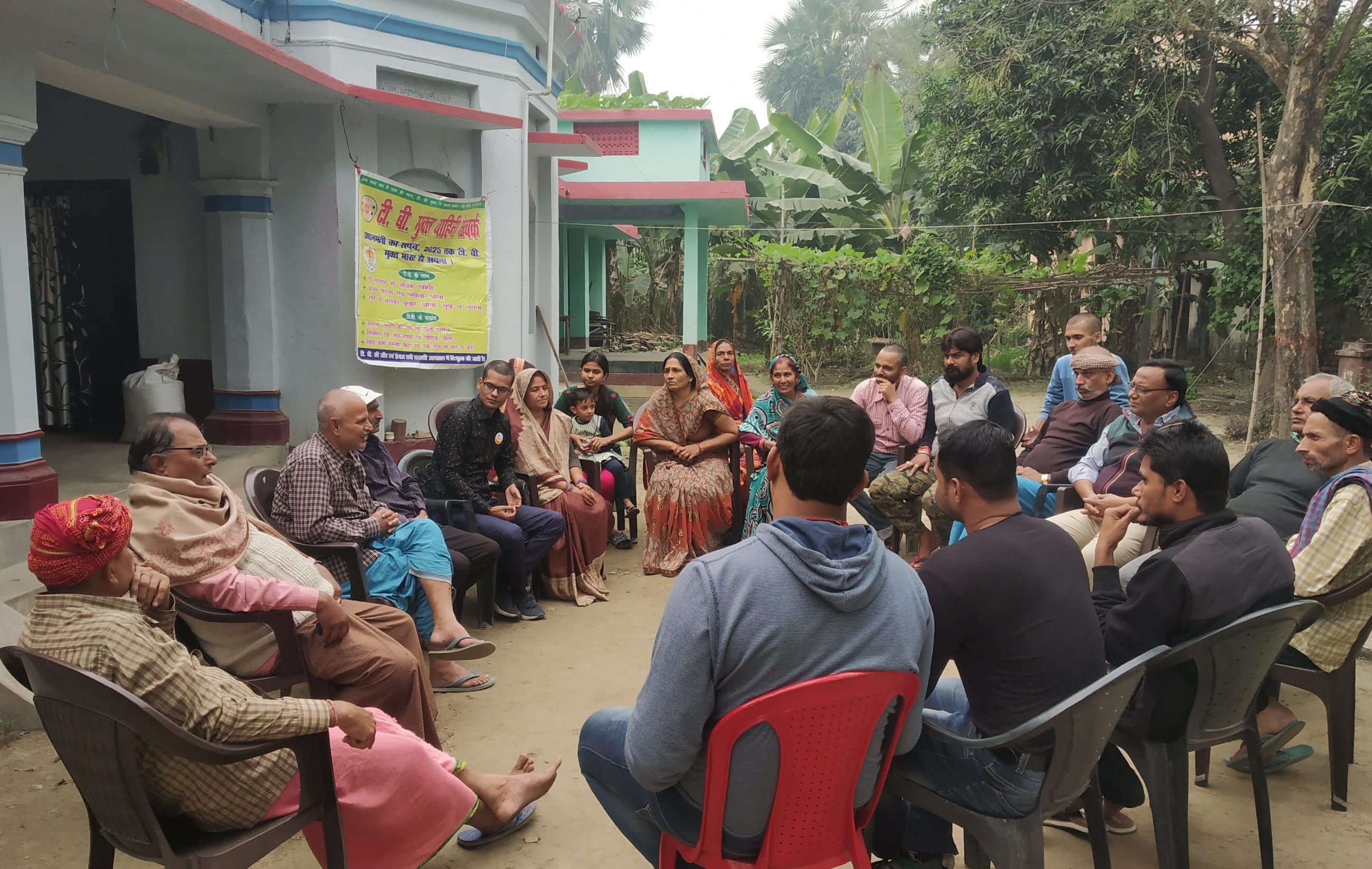 A community meeting organized by TB Mukt Vahini in a village in Bihar, where TB survivors, families, and local residents discuss treatment, stigma, access to care, and how to continue funding the TB Mukt Vahini campaign, in Patna, Bihar, India, on January 2024.