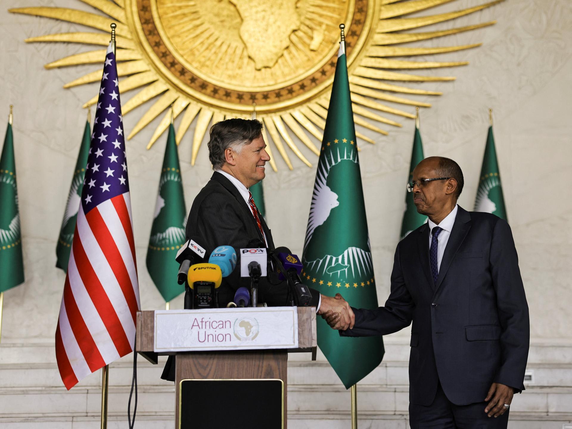 U.S. Deputy Secretary of State Christopher Landau shakes hands with African Union Commission Chair Mahamoud Ali Youssouf, at the African Union headquarters, in Addis Ababa, Ethiopia, on January 28, 2026.