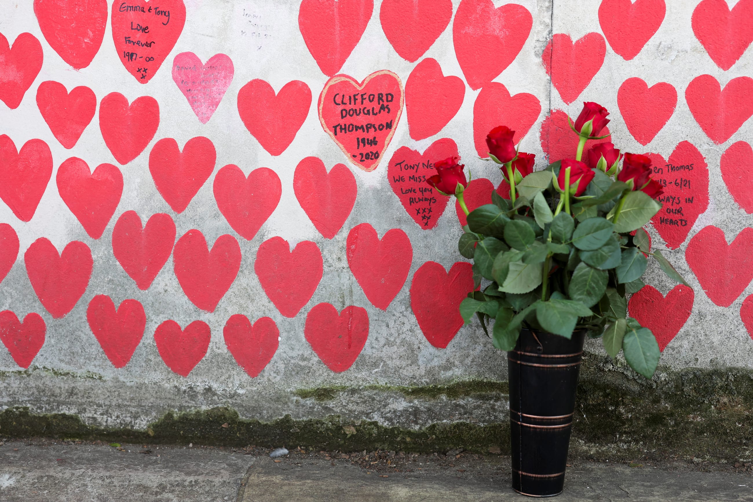 Flowers are placed near the National COVID Memorial Wall on the COVID-19 Day of Reflection, in London, Britain, on March 9, 2025.