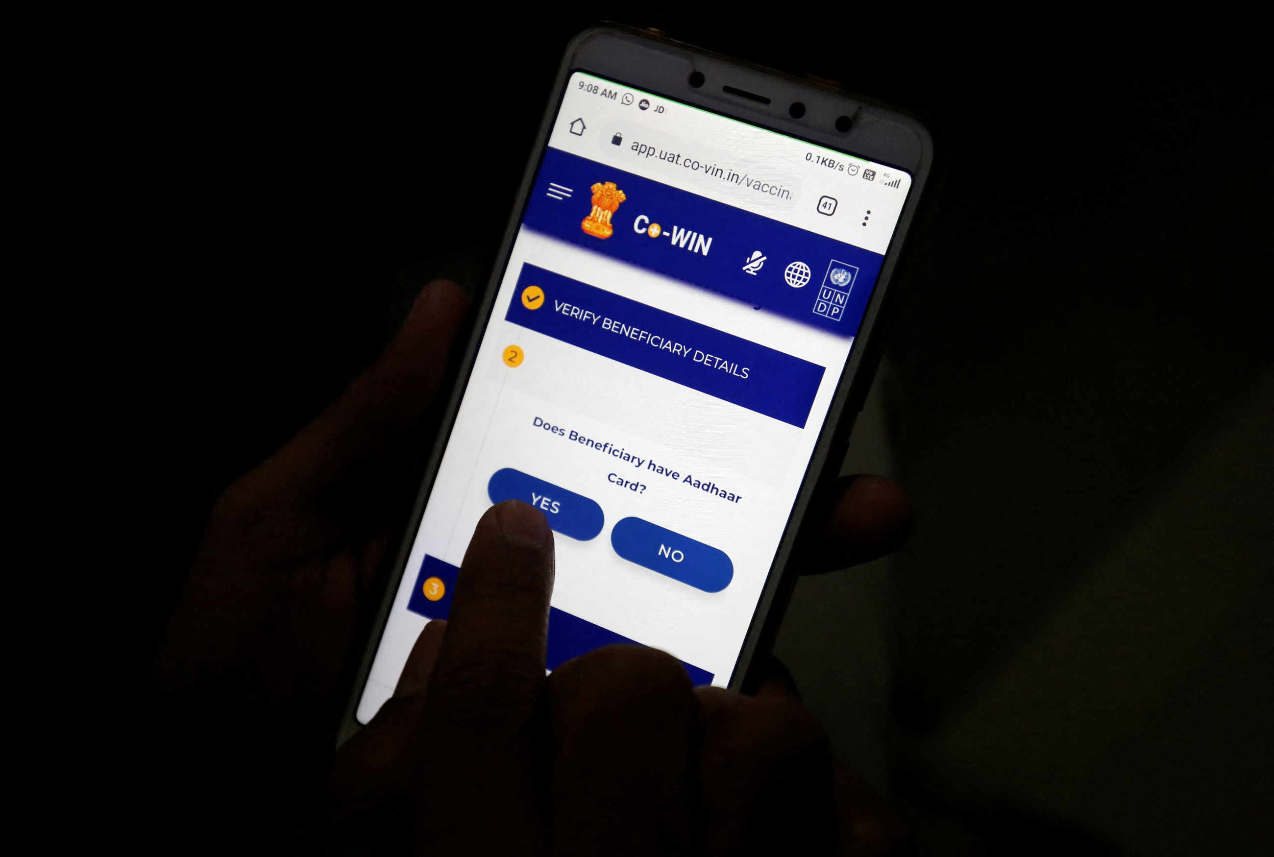A health-care worker enters data into the COVID Vaccine Intelligence Network app, a digital platform being used for vaccine distribution, at a village in Gandhinagar, India, on December 29, 2020.