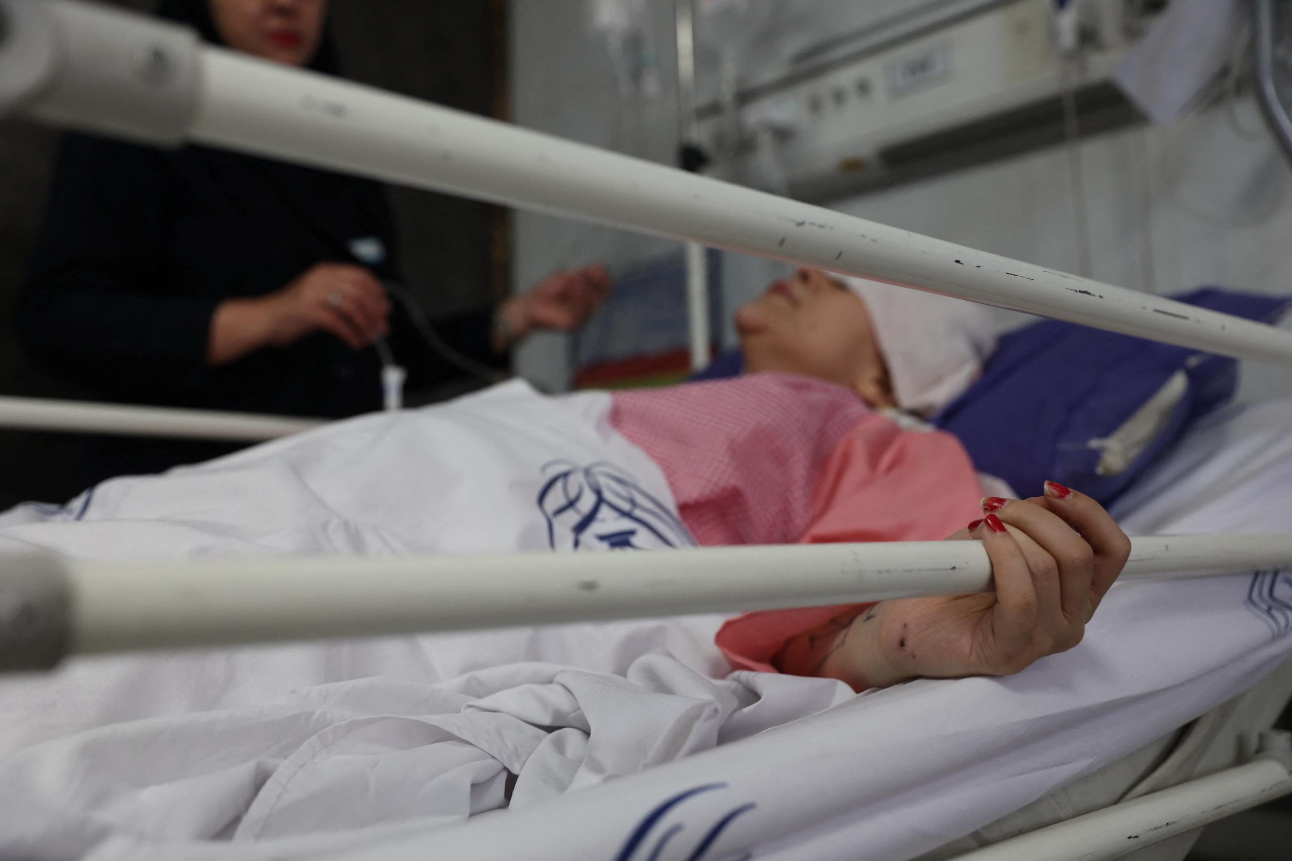 An injured woman is treated in a hospital, amid the Iran-Israel conflict, in Tehran, Iran, on June 21, 2025.