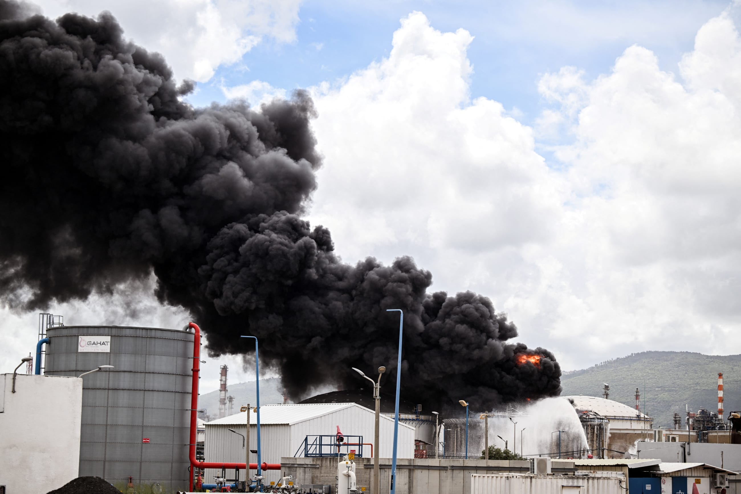 A blaze after Israel's Fire and Rescue Service said that an industrial building and a fuel tanker at Israel's Oil Refineries were hit by debris from an intercepted Iranian missile, amid the U.S.-Israel conflict with Iran, in Haifa, Israel, on March 30, 2026.