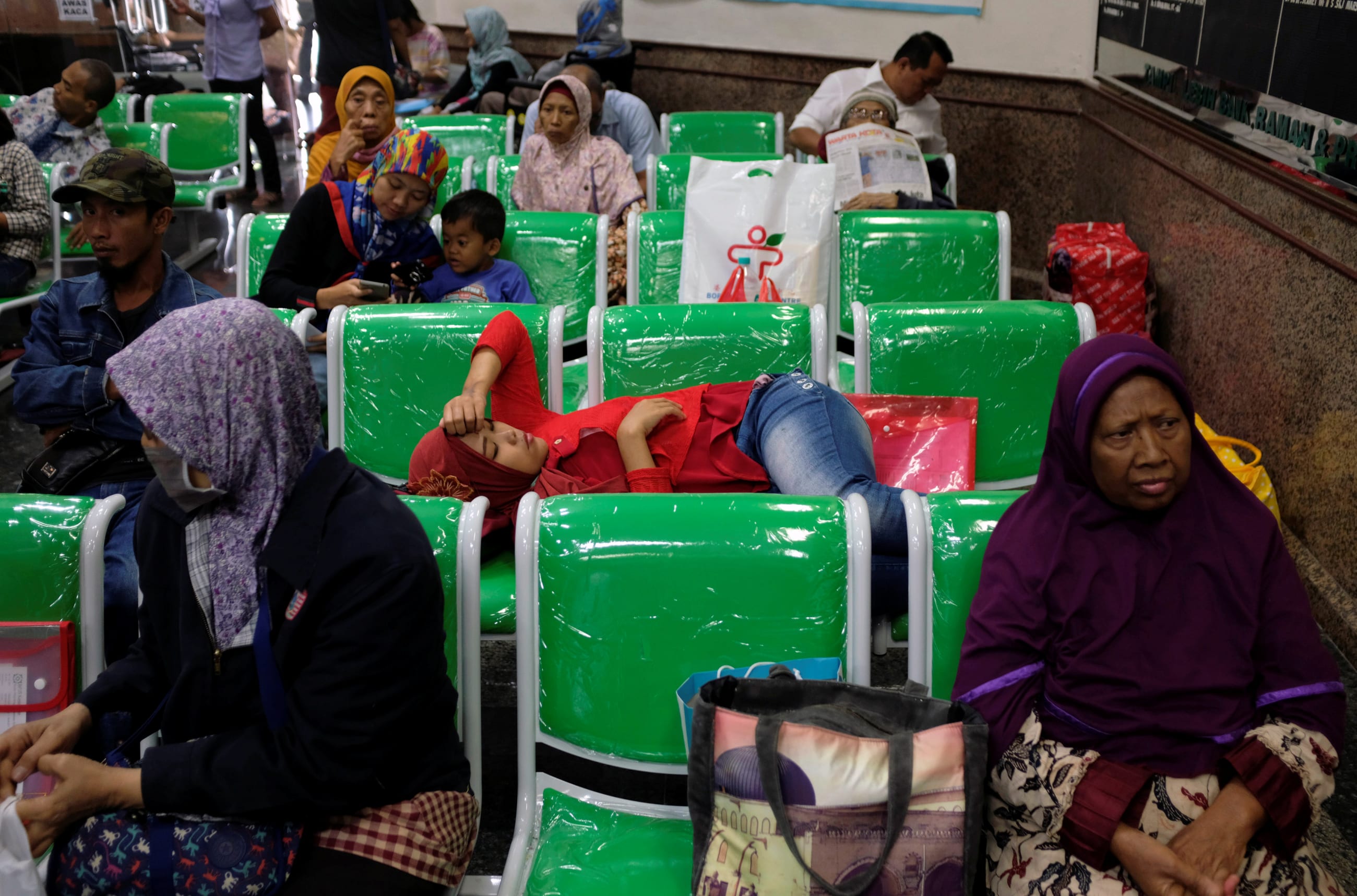 Patients and family wait for their turn to register at Dharmais Hospital, Indonesia's biggest cancer hospital, in Jakarta, Indonesia, on May 15, 2017.