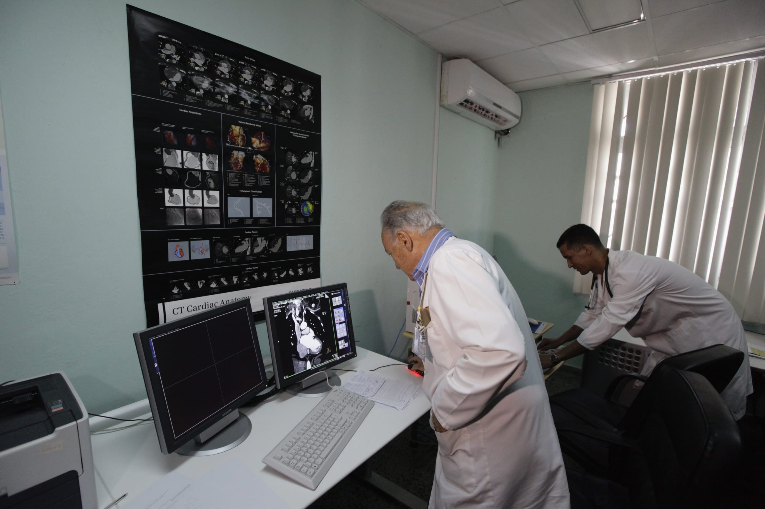 Doctors work in the tomography section of Havana's main cardiology and heart surgery hospital, in Havana, Cuba, on October 19, 2012.