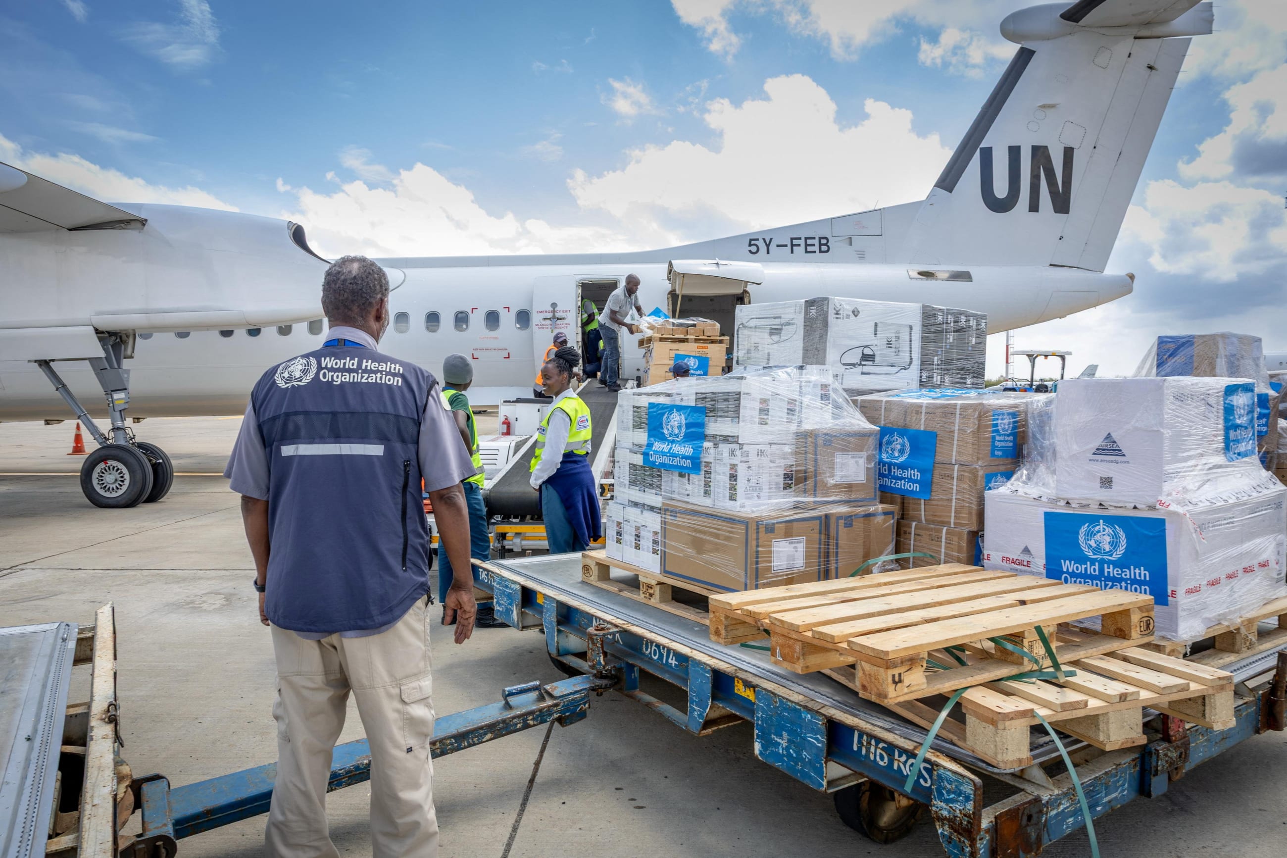 WHO workers mobilize 4.7 tons of essential medical supplies and emergency kits in response to the Ebola outbreak in Democratic Republic of Congo, from the Jomo Kenyatta International Airport, in Nairobi, Kenya, on May 18, 2026.
