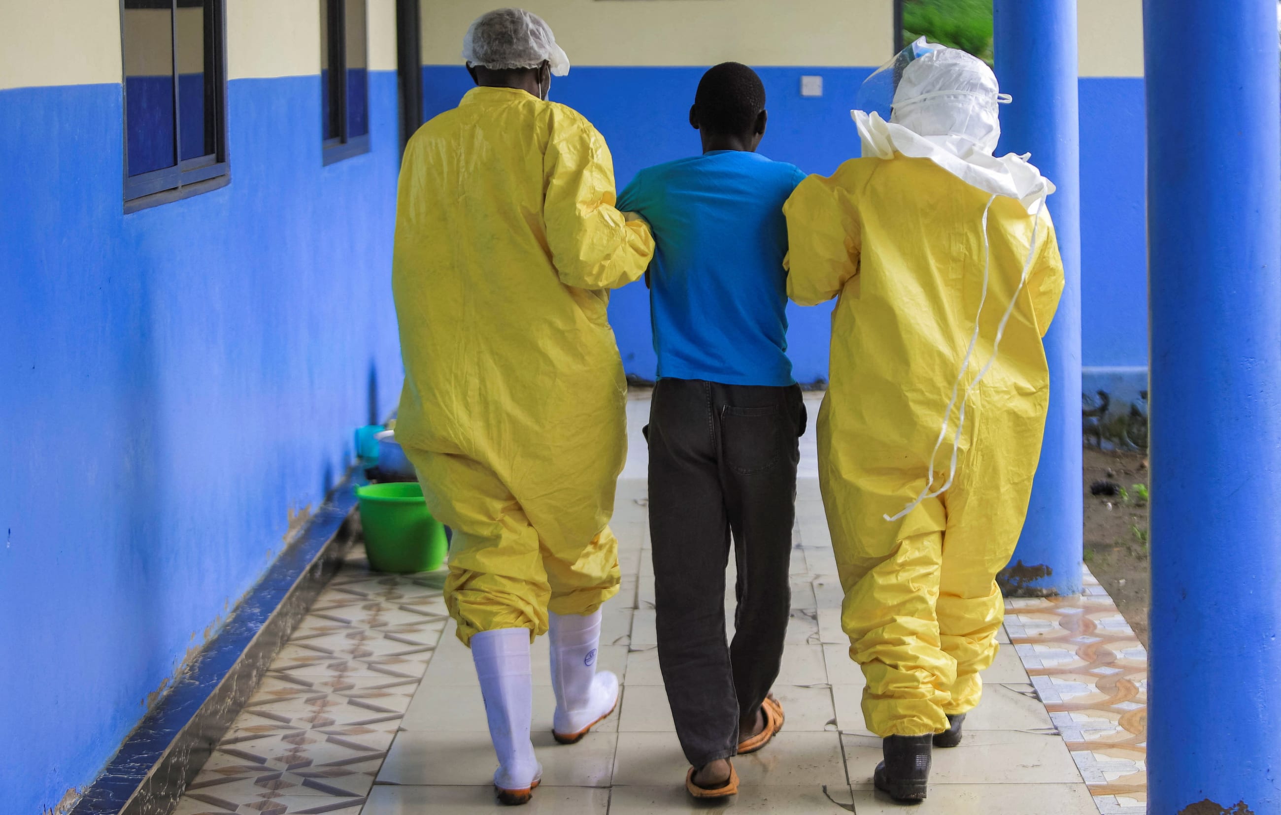 Congolese health workers receive a patient at the Rwampara General Hospital amid an Ebola outbreak involving the Bundibugyo strain, in Rwampara, Ituri province, Democratic Republic of Congo, on May 21, 2026.