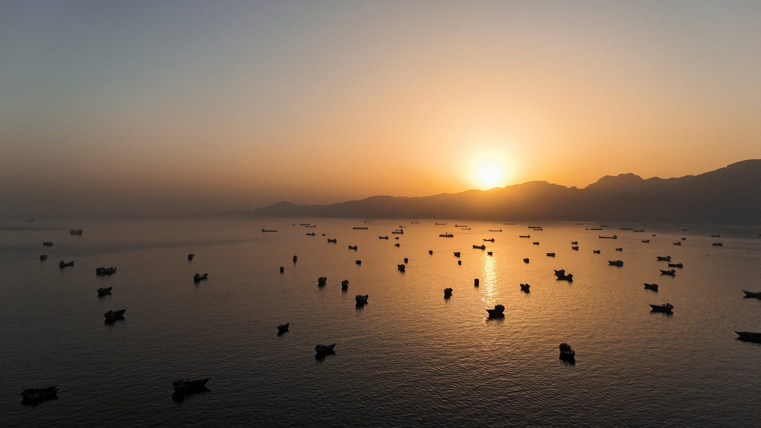 A drone view of vessels anchored in the Strait of Hormuz, as seen from Musandam, Oman, on June 3, 2026.