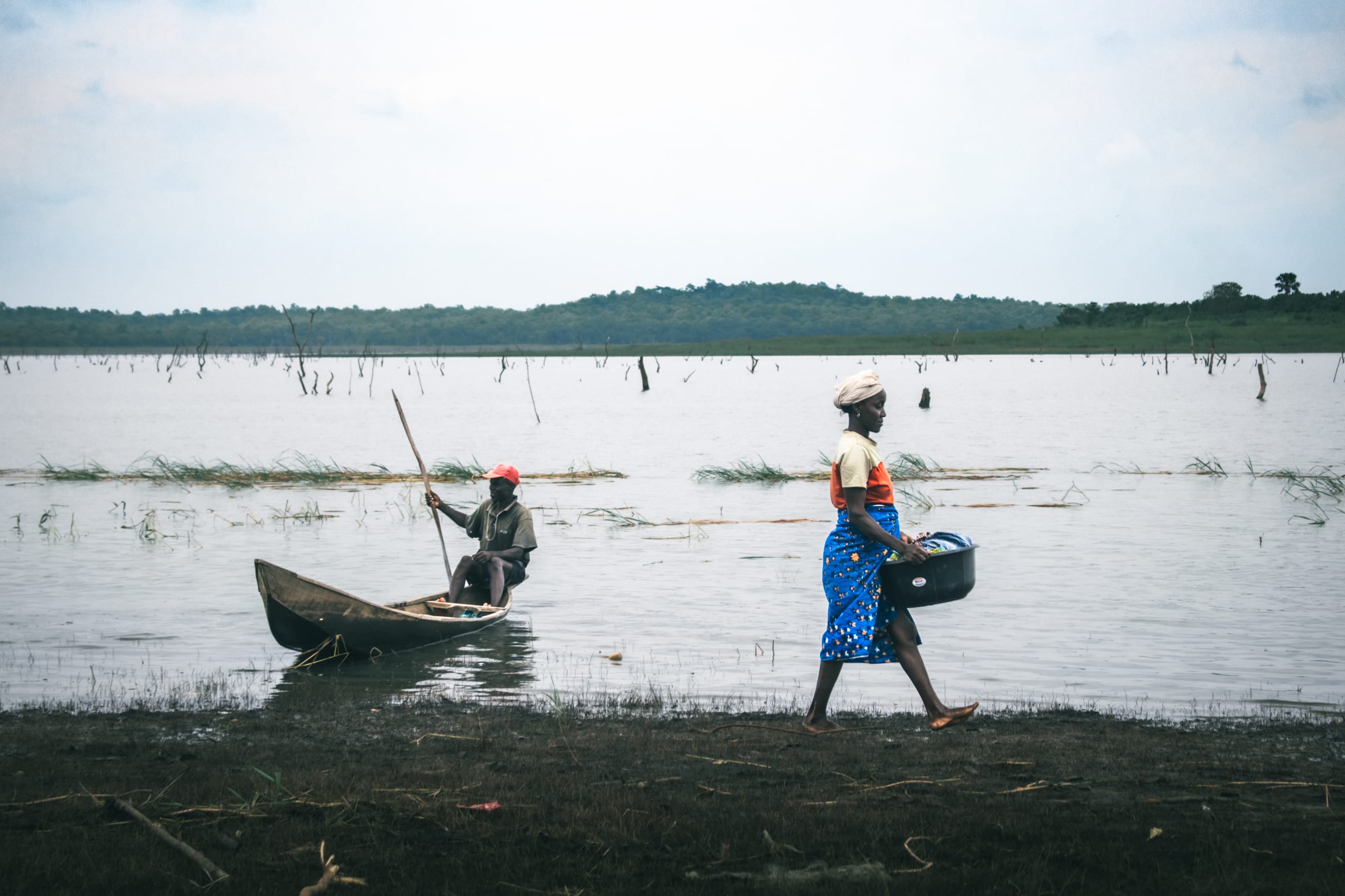 Residents are seen at the Oyan River, on July 2025.
