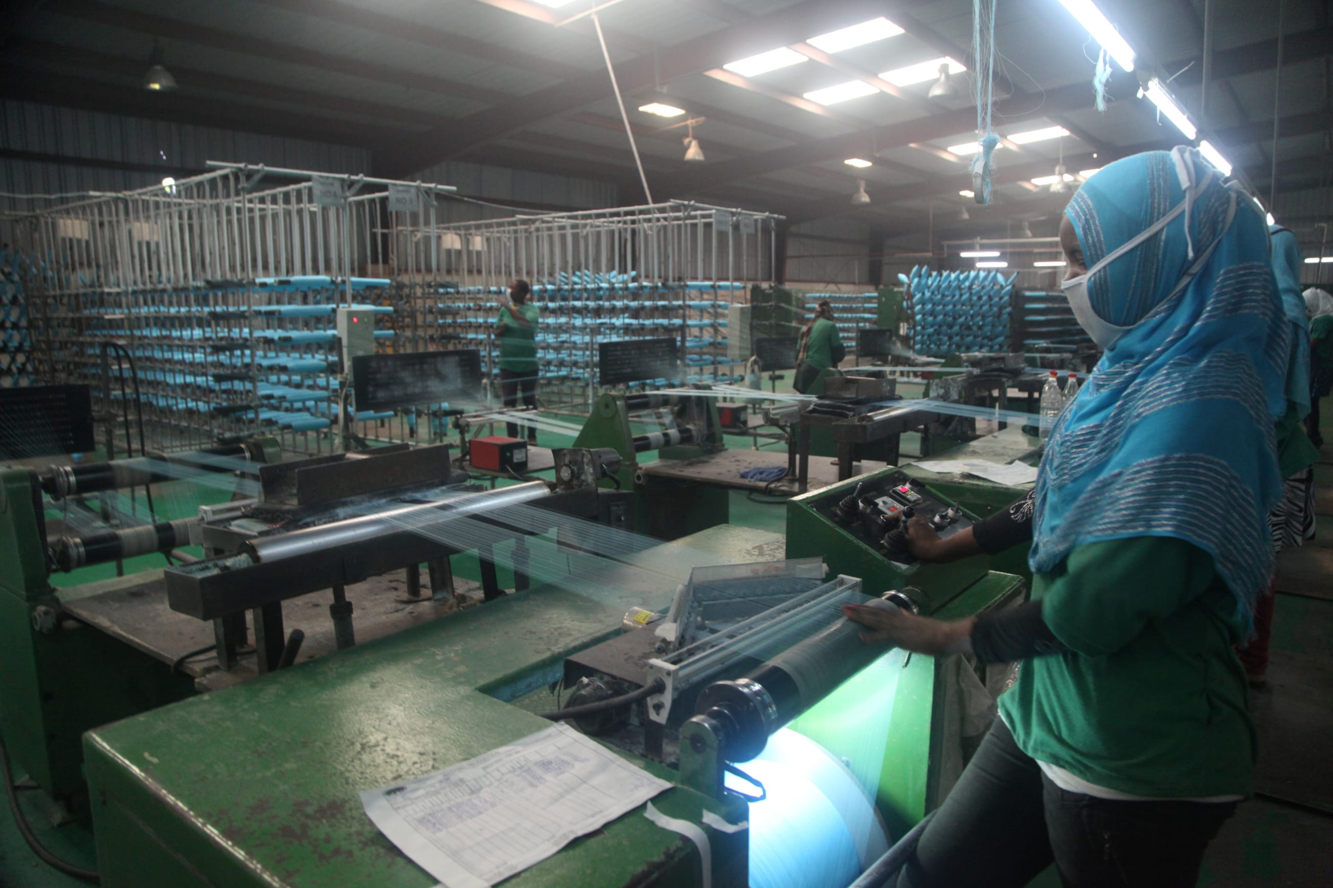 Workers prepare yarn at the A to Z Textile Mills factory producing insecticide-treated bednets in Arusha, Tanzania, May 10, 2016